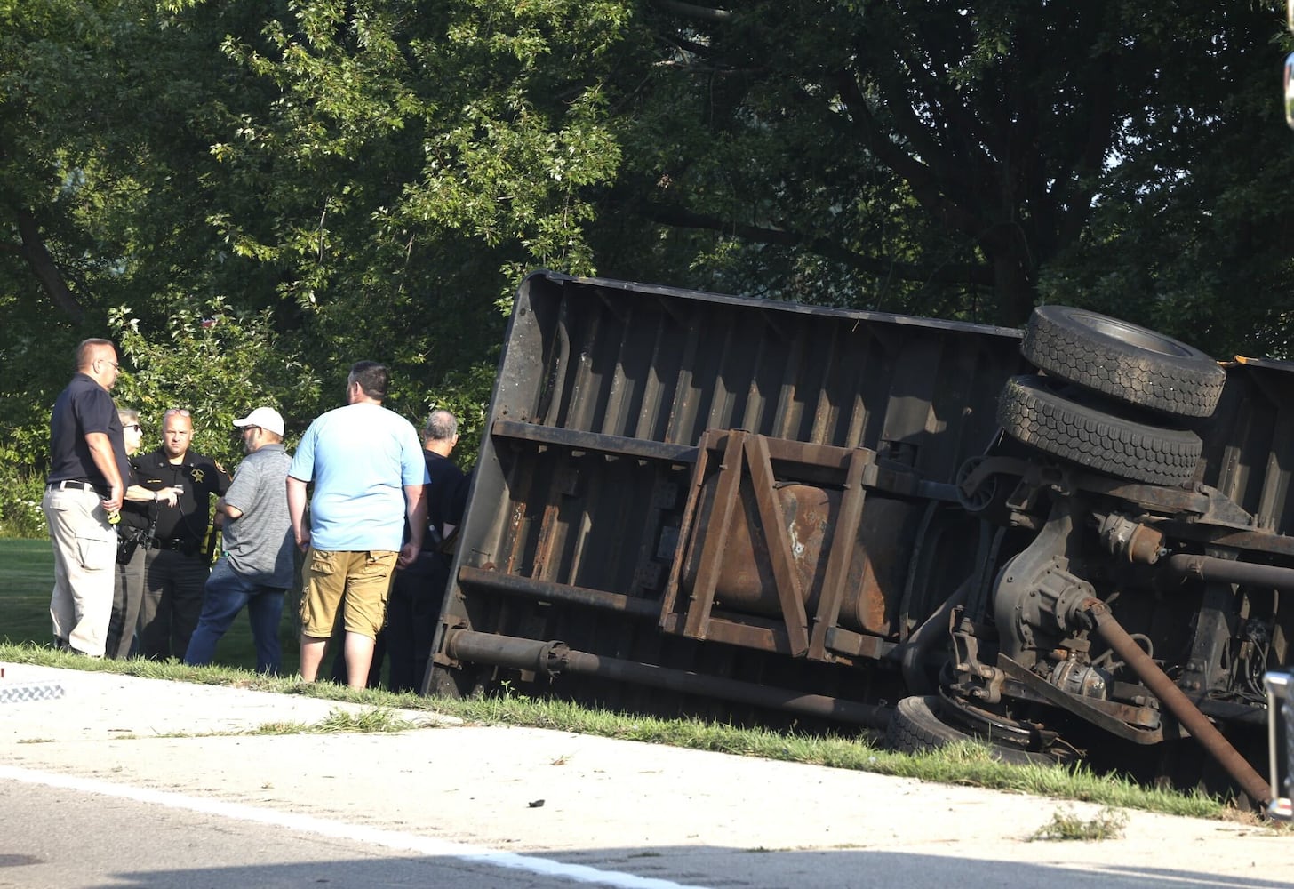 One killed after Northwestern school bus overturns in crash