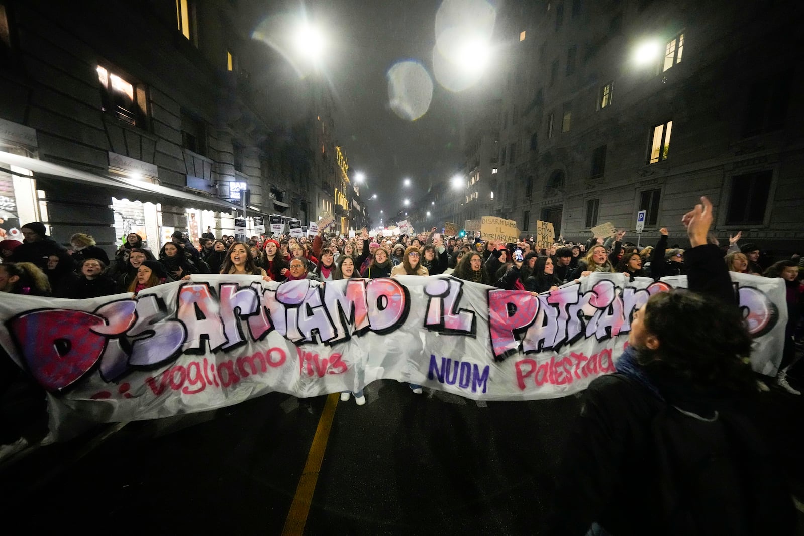 Women attend a rally to mark the International Day for the Elimination of Violence against women, in Milan, Italy, Monday, Nov. 25, 2024. (AP Photo/Luca Bruno)