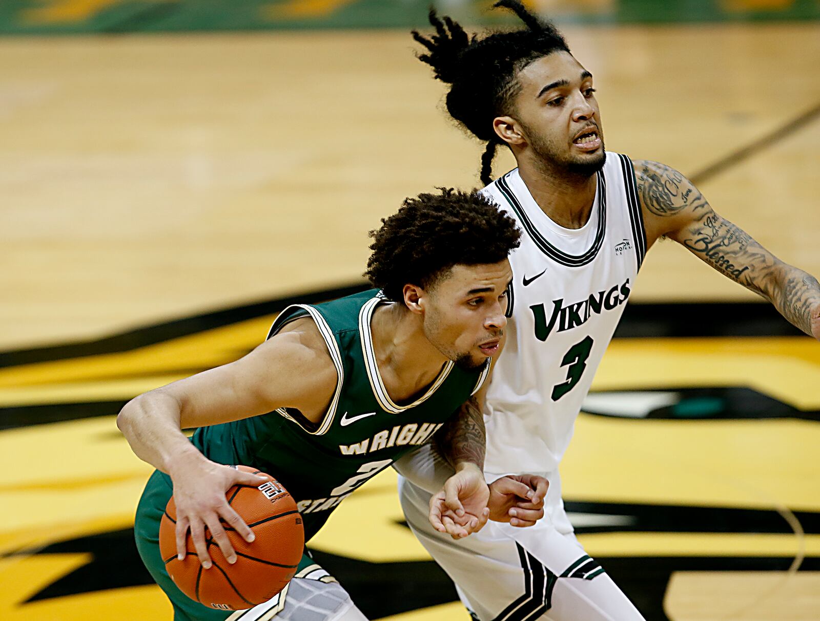 Wright State guard Tanner Holden races Cleveland State guard Craig Beaudion to the hoop during a Horizon League game at the Nutter Center in Fairborn Jan. 16, 2021. Wright State won 85-49. Contributed photo by E.L. Hubbard