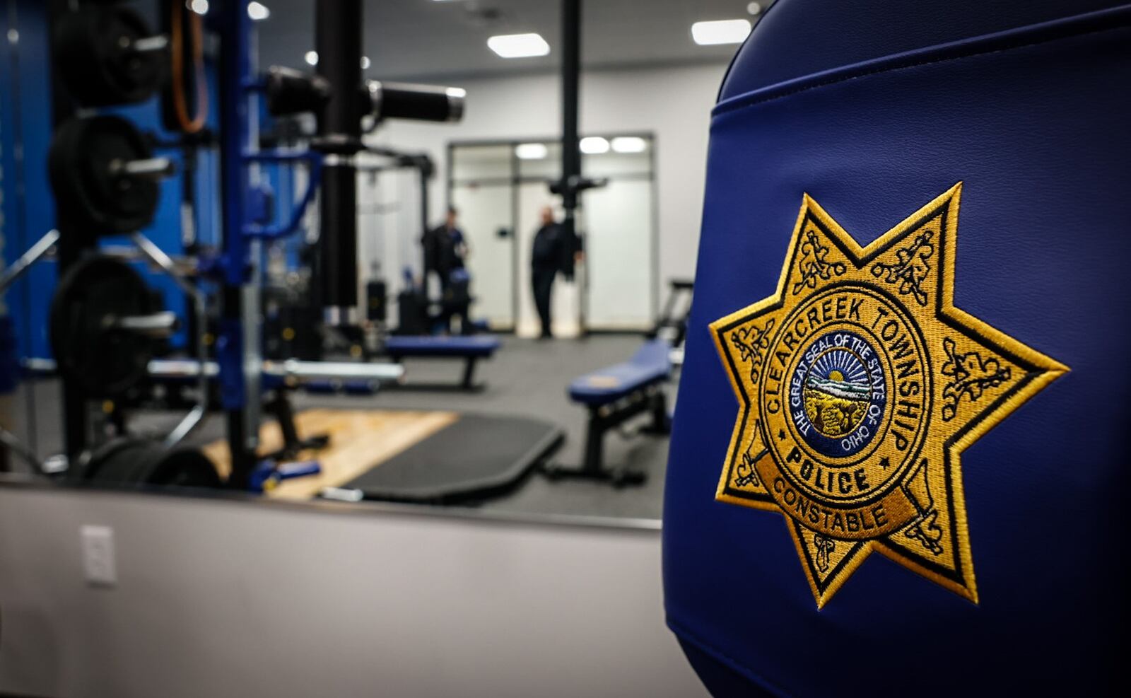 The new Clearcreek Twp. police station workout room has the Clearcreek Twp. police badge embroidered on the equipment sleeve. JIM NOELKER/STAFF