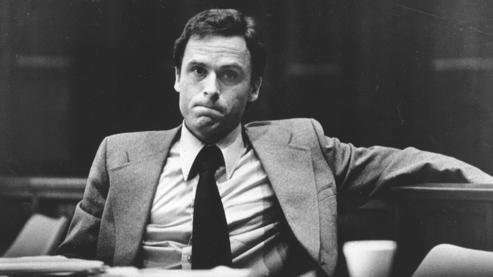 FILE - In this June 27, 1979 file photo, accused murderer Ted Bundy stares out at the photographer during the second day of jury selection in his murder trial in Miami, Fla. Authorities say DNA testing helped them confirm the notorious serial killer also murdered a northern Utah teen. KSL-TV reports Bountiful Police Sgt. Shane Alexander announced Monday, March 11, 2019, that investigators retrieved a human kneecap in 2015 that authorities had given to the family of Debra Kent. Alexander says DNA testing on the bone confirmed it belonged to Kent. Alexander says the 17-year-old Kent was with her parents at a Viewmont High School play in 1974, when she left and never returned .