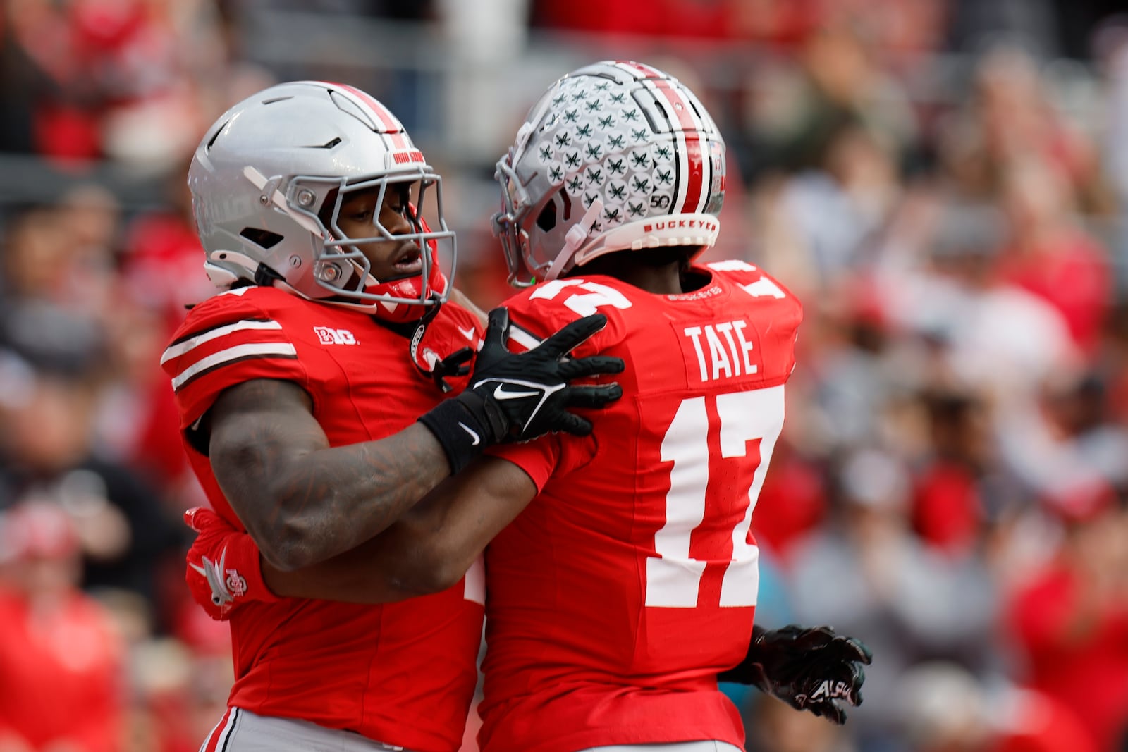 Ohio State receiver Jeremiah Smith, left, celebrates his touchdown against Purdue with teammate Carnell Tate during the first half of an NCAA college football game Saturday, Nov. 9, 2024, in Columbus, Ohio. (AP Photo/Jay LaPrete)