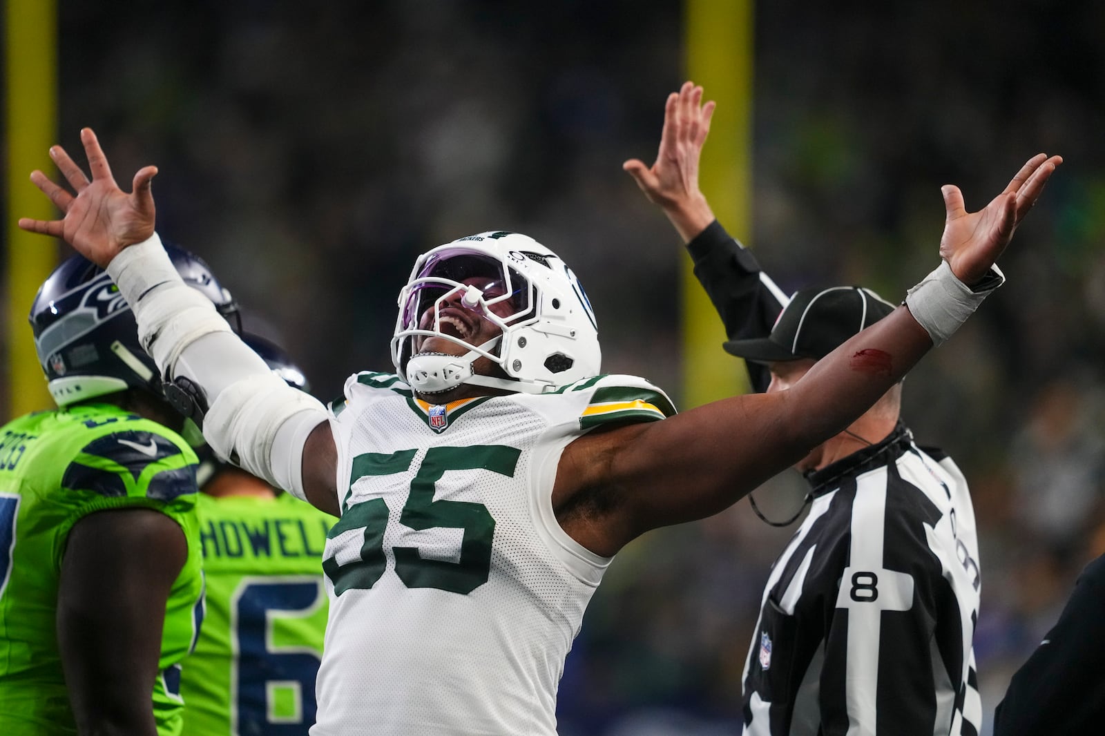 Green Bay Packers' Kingsley Enagbare reacts to a sack during the second half of an NFL football game against the Seattle Seahawks Sunday, Dec. 15, 2024, in Seattle. (AP Photo/Lindsey Wasson)