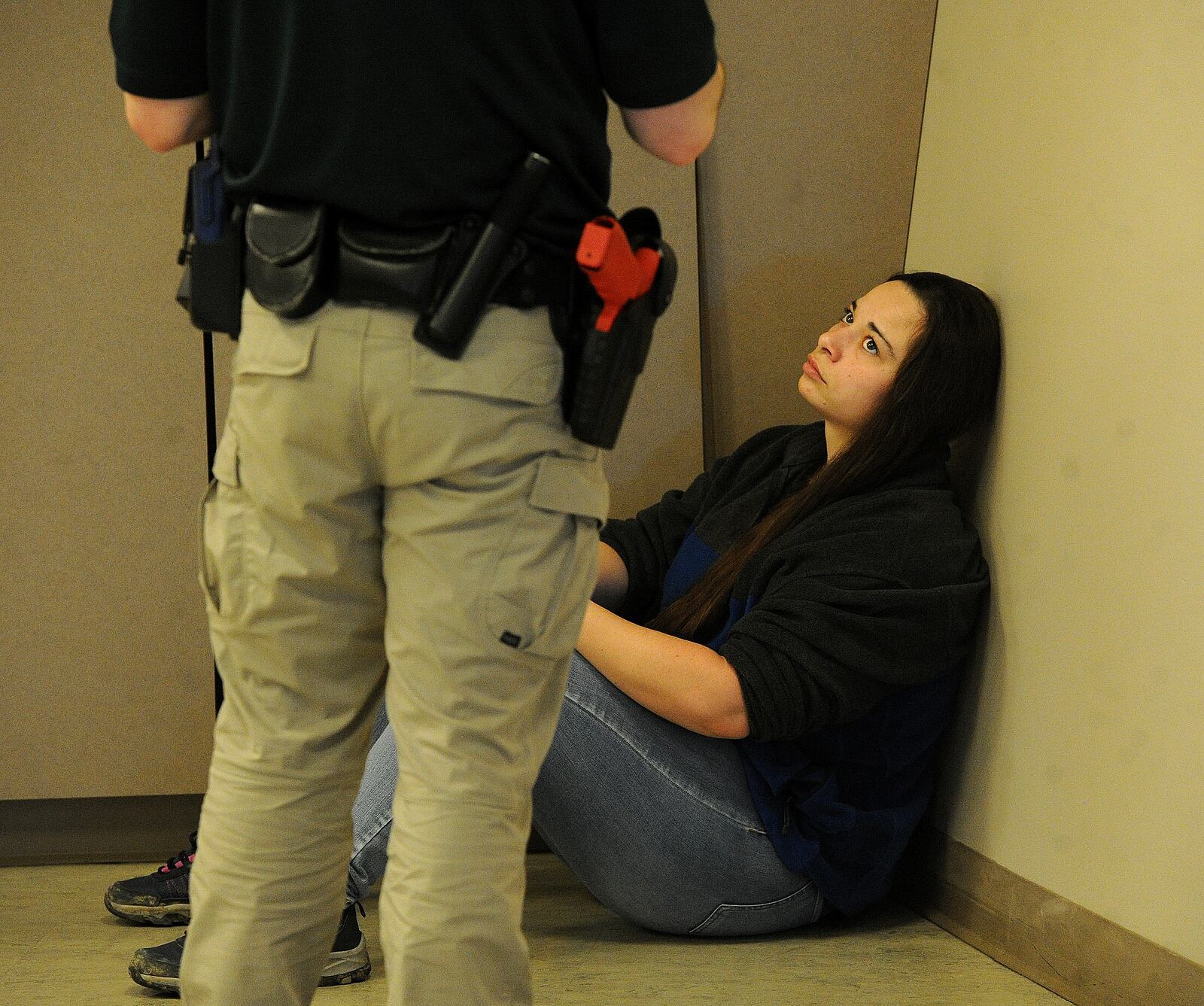 Deputy Keri Benoit of the Butler County Sheriffs Office is an actor for the Sinclair Police Academy's crisis intervention practicals, helping cadets learn how to talk down people in mental health crisis. MARSHALL GORBY/STAFF