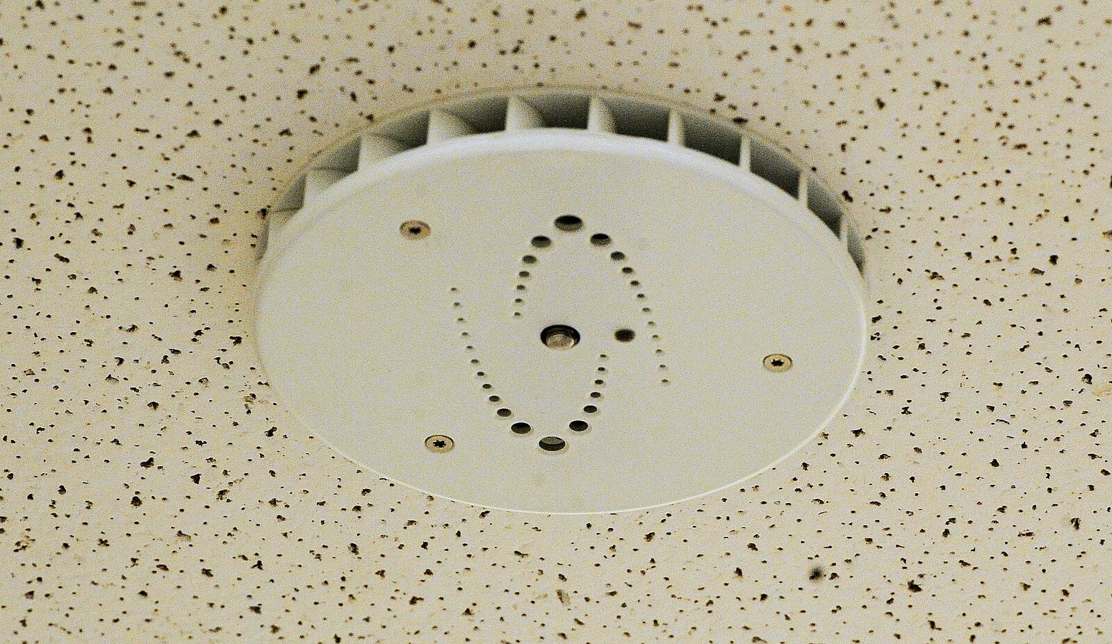 This is one of the 45 HALO Smart Sensor devices installed in bathrooms and locker rooms this summer at Miamisburg High School and Miamisburg Middle School. The devices can detect if there was a gunshot or call for help, and also discern vapor, smoke, carbon dioxide, carbon monoxide, THC or tampering, and immediately alert police and school officials. MARSHALL GORBY\STAFF