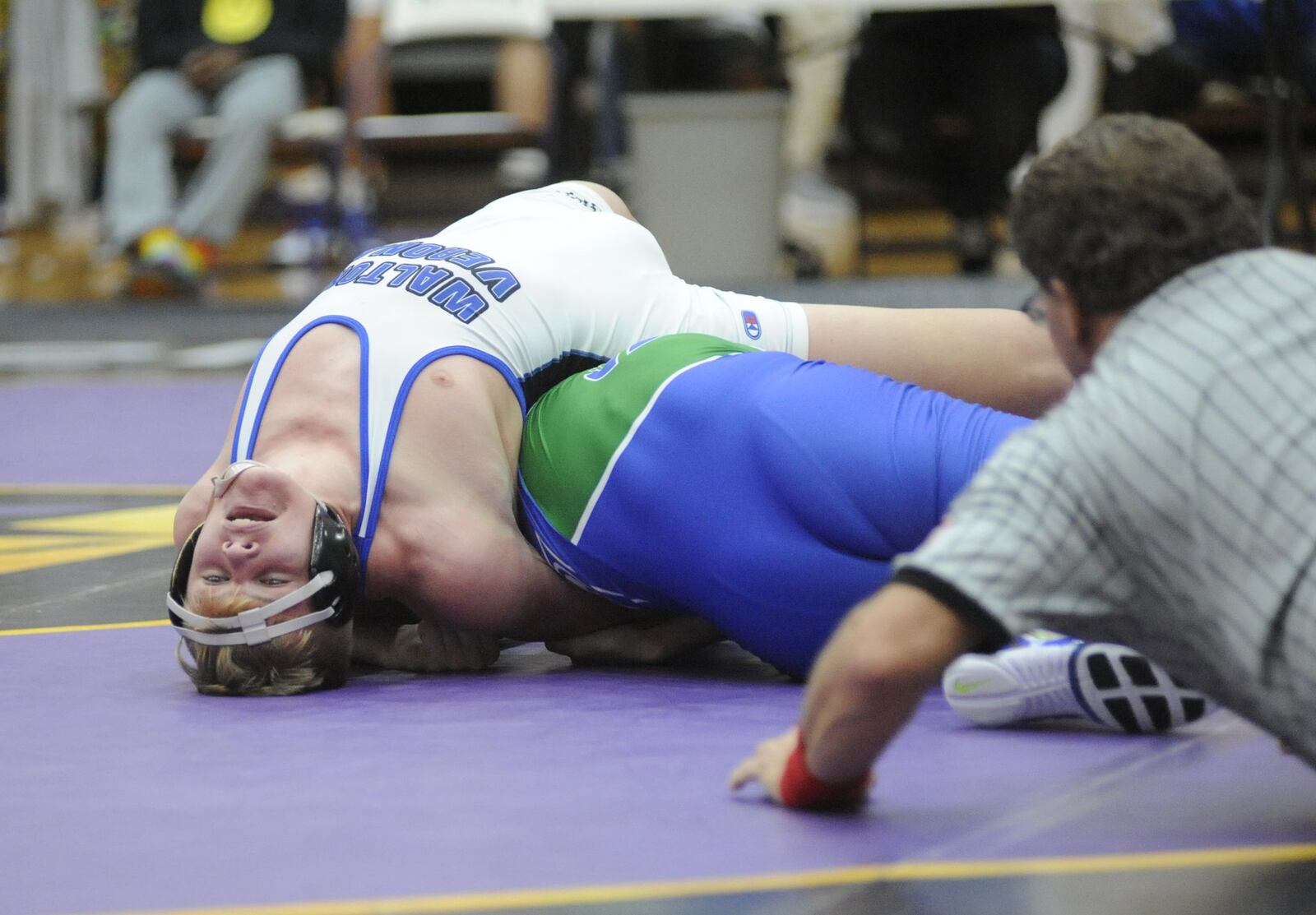 Daulton Mayer of Walton-Verona (left) lost 9-4 to Hunter Johns of Chaminade Julienne in the 182-pound final of the GMVWA Holiday Tournament at Vandalia on Friday, Dec. 28, 2018. MARC PENDLETON / STAFF