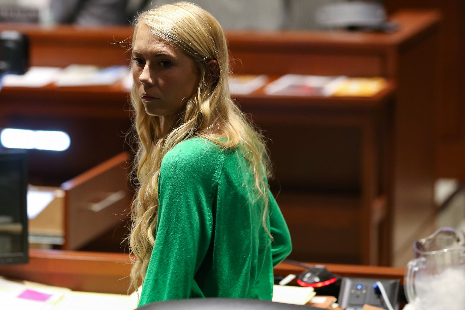 Brooke Sylar Richardson stands during a break during court proceedings, Wednesday, Sept. 11, 2019, in Warren County Judge Donald Oda's II courtroom at Warren County Common Pleas Court in Lebanon, Ohio. Richardson, 20, is accused of killing and burying her baby in the backyard of her Carlisle home. Richardson is charged with aggravated murder, involuntary manslaughter, gross abuse of a corpse, tampering with evidence and child endangerment in the death of her newborn infant. She faces the possibility of life in prison.