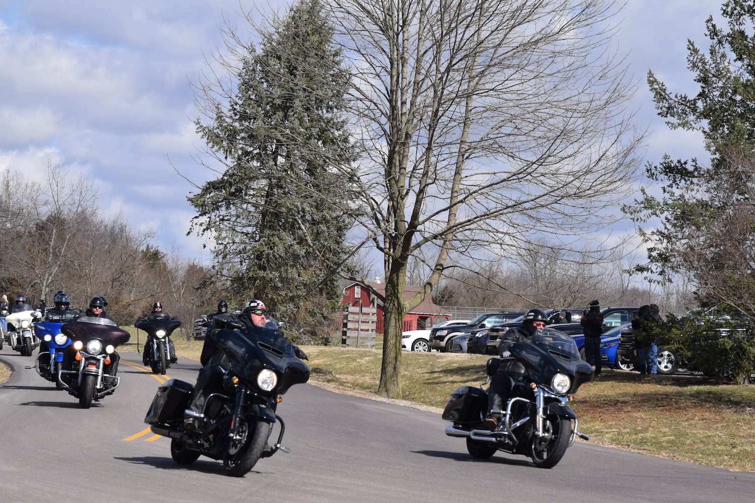 PHOTOS: Thousands of Outlaws attend motorcycle gang leaders funeral at Montgomery County Fairgrounds.