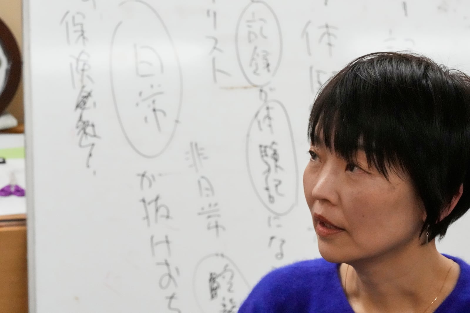 Ai Saotome speaks on her father honorary director Katsumoto Saotome at the Center of the Tokyo Raids and War Damage, on Feb. 24, 2025, in Tokyo. (AP Photo/Eugene Hoshiko)