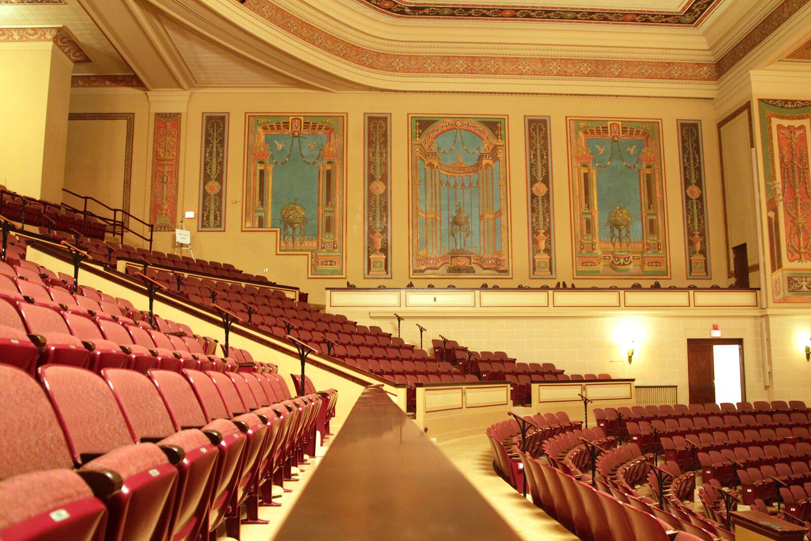 Hand painted murals decorate the Schiewetz Auditorium within the Dayton Masonic Center. The venue has become a Dayton spot for live music.  LISA POWELL / STAFF