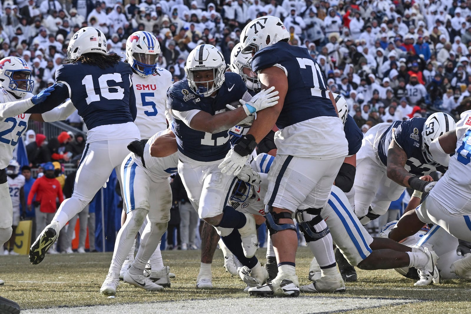 Penn State running back Kaytron Allen (13) scores a touchdown during the second half against SMU in the first round of the College Football Playoff, Saturday, Dec. 21, 2024, in State College, Pa. (AP Photo/Barry Reeger)