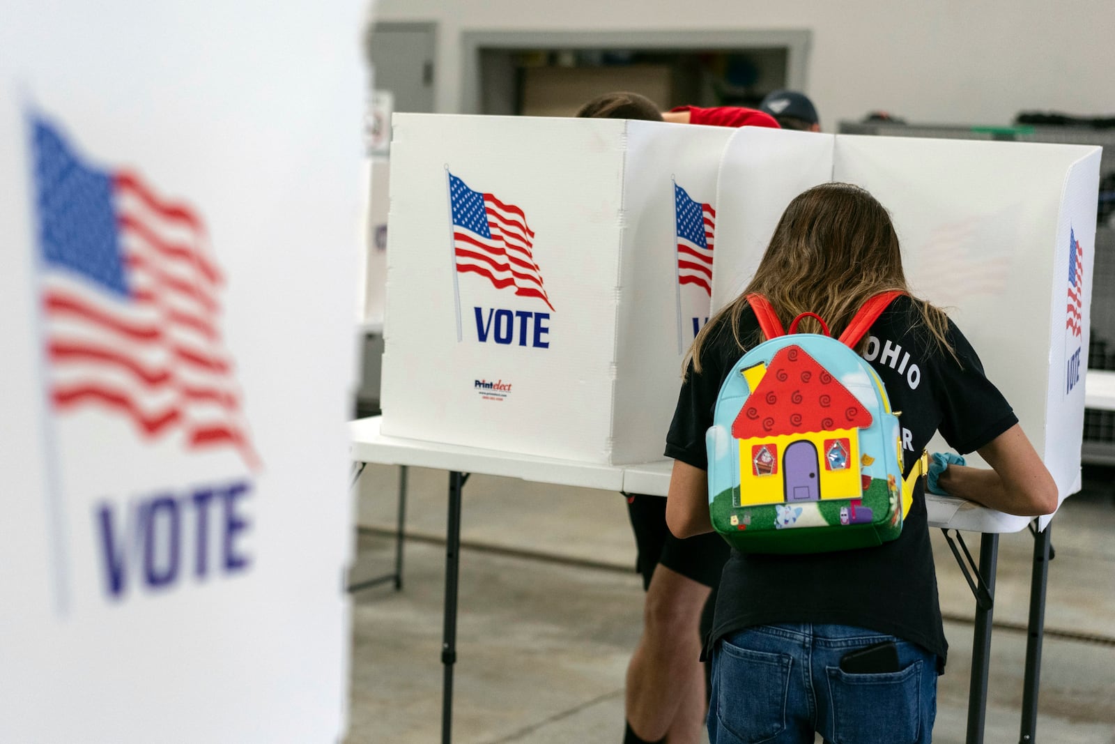 A voter fills out a ballot at the Pleasant Township Fire Department on Election Day, Tuesday, Nov. 5, 2024, in Catawba, Ohio. (AP Photo/Carolyn Kaster)