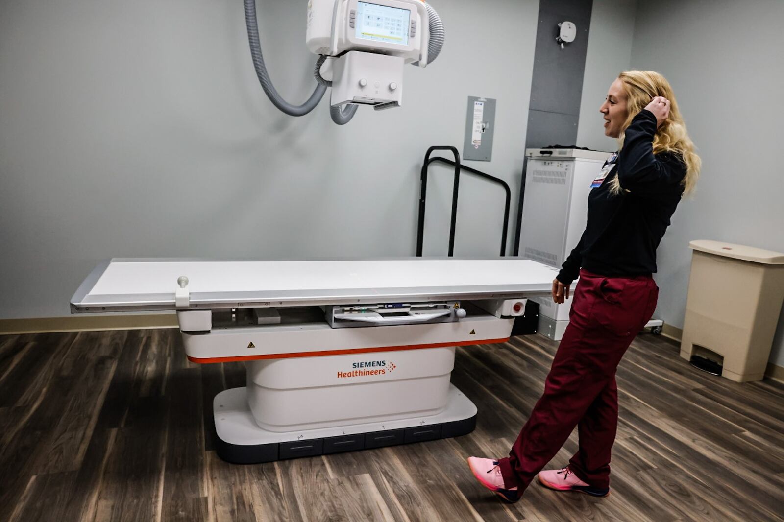 Northwest Health and Wellness Campus x-ray technician Kandra Couch demonstrates the up-to-date x-ray machine at the new facility. JIM NOELKER/STAFF