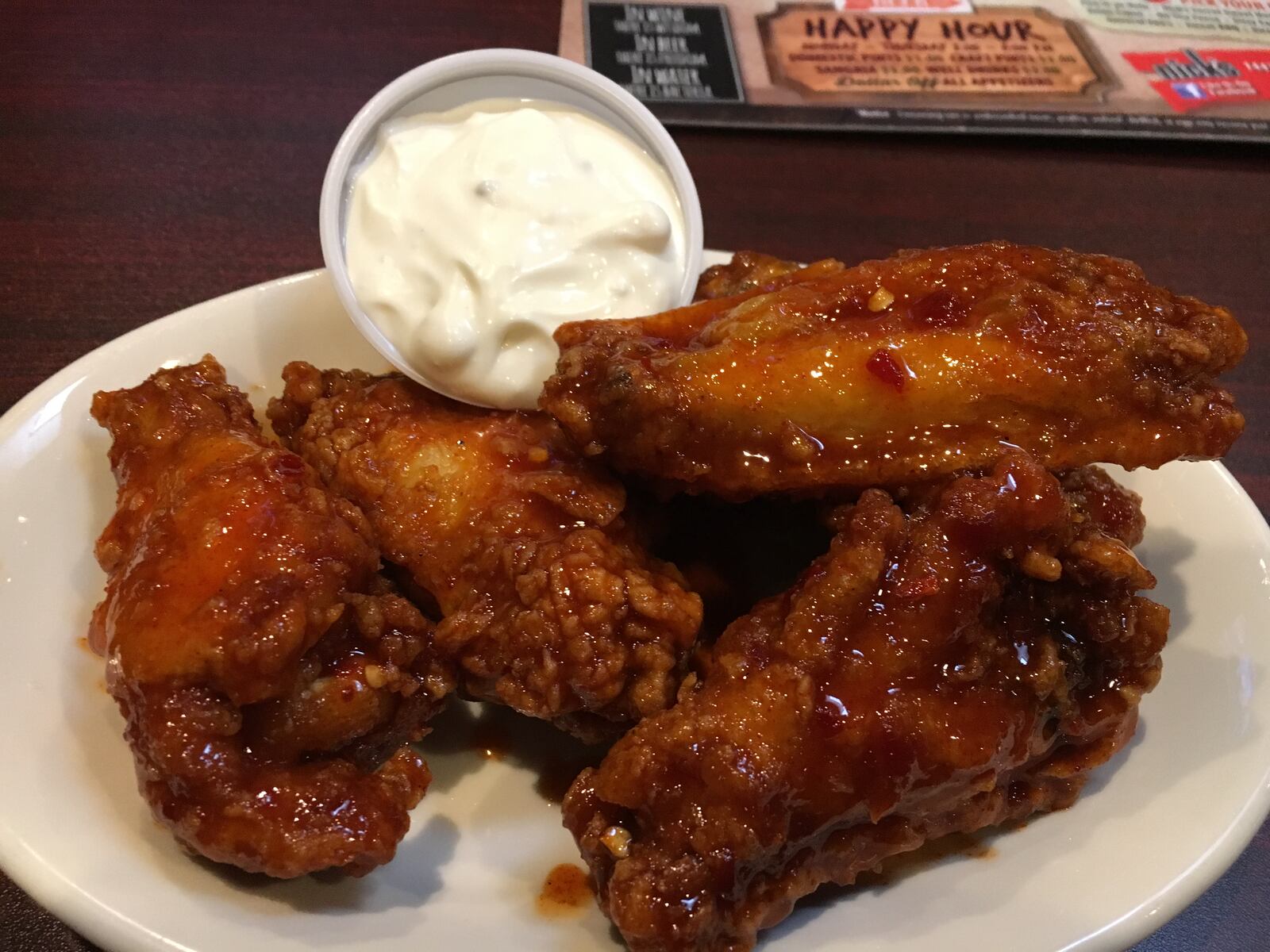 Nick's breaded wings slathered in the Sweet Hot Damn sauce.