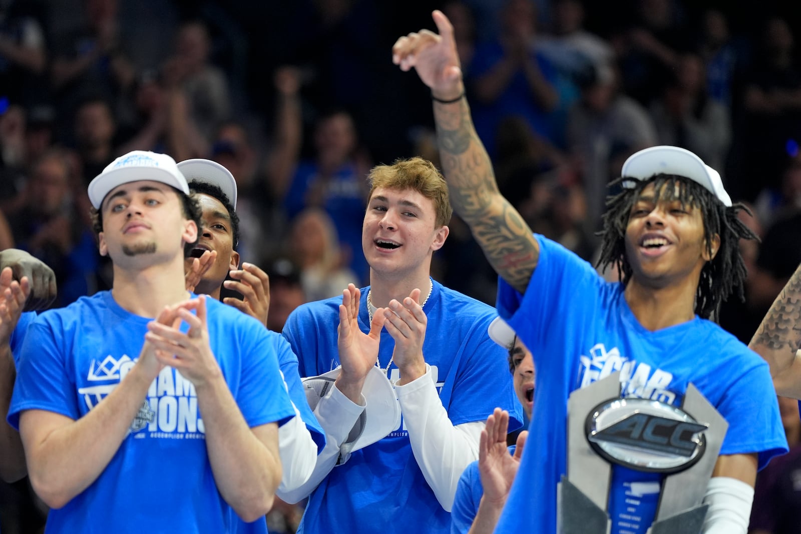 Duke forward Cooper Flagg celebrates after their win against Louisville after an NCAA college basketball game in the championship of the Atlantic Coast Conference tournament, Saturday, March 15, 2025, in Charlotte, N.C. (AP Photo/Chris Carlson)