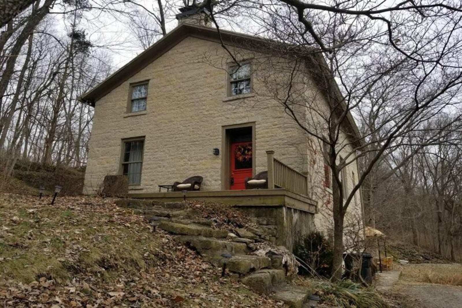 Built of limestone from the adjacent cliff, the house looks much younger than its 170 years. Photo courtesy of Partington Spring House