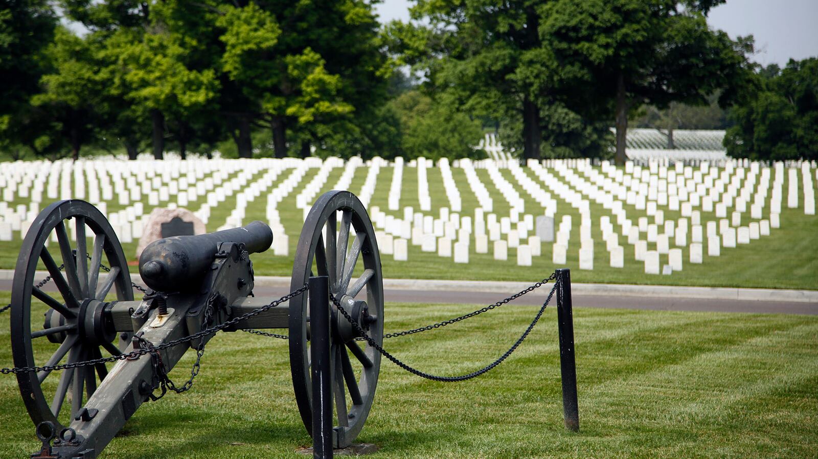 A cannon near the Dayton National Cemetery overlooks sections I and S.  TY GREENLEES / STAFF