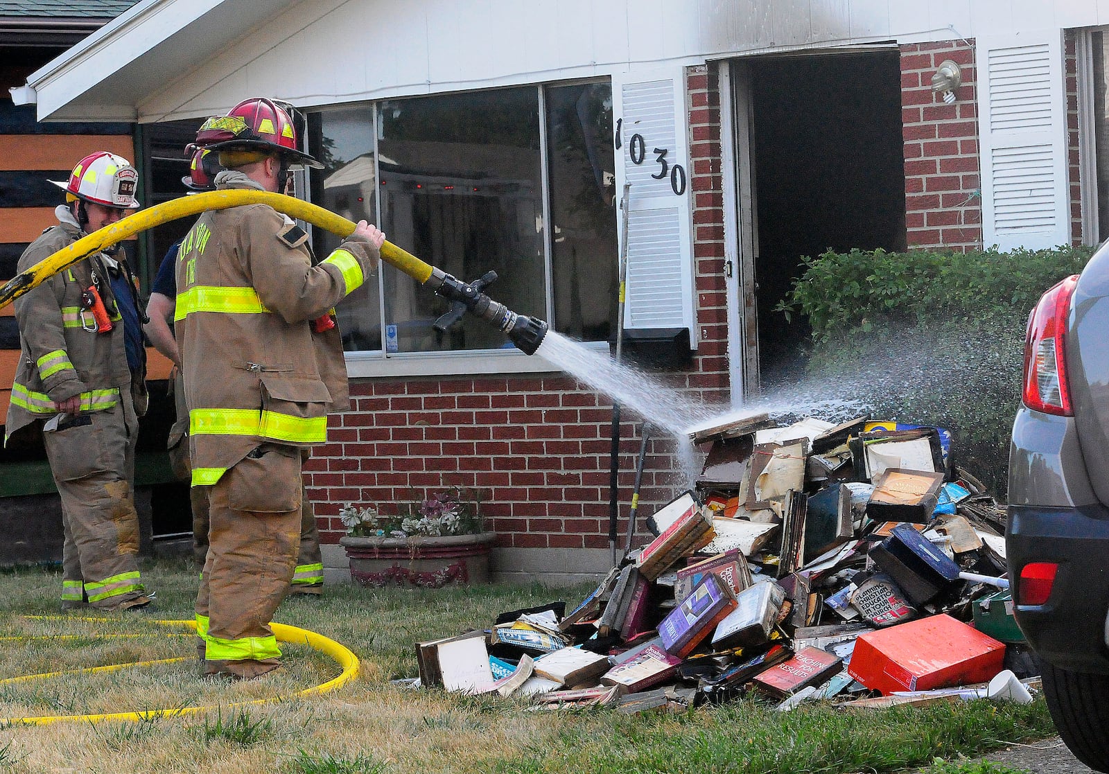 Dayton firefighters were dispatched at 6:56 a.m. to the 1000 block of Charleston Boulevard, Tuesday, July 2, 2024 for a house fire. Firefighters rescued a woman from the home and she was transported to a local hospital. MARSHALL GORBY\STAFF