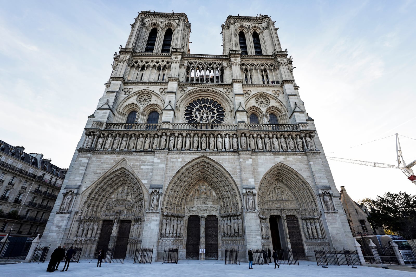 The facade of Notre-Dame de Paris cathedral in Paris, is seen Friday Nov. 29, 2024, ahead of French President Emmanuel Macron's final visit to the construction site to see the restored interiors. (Stephane de Sakutin, Pool via AP)