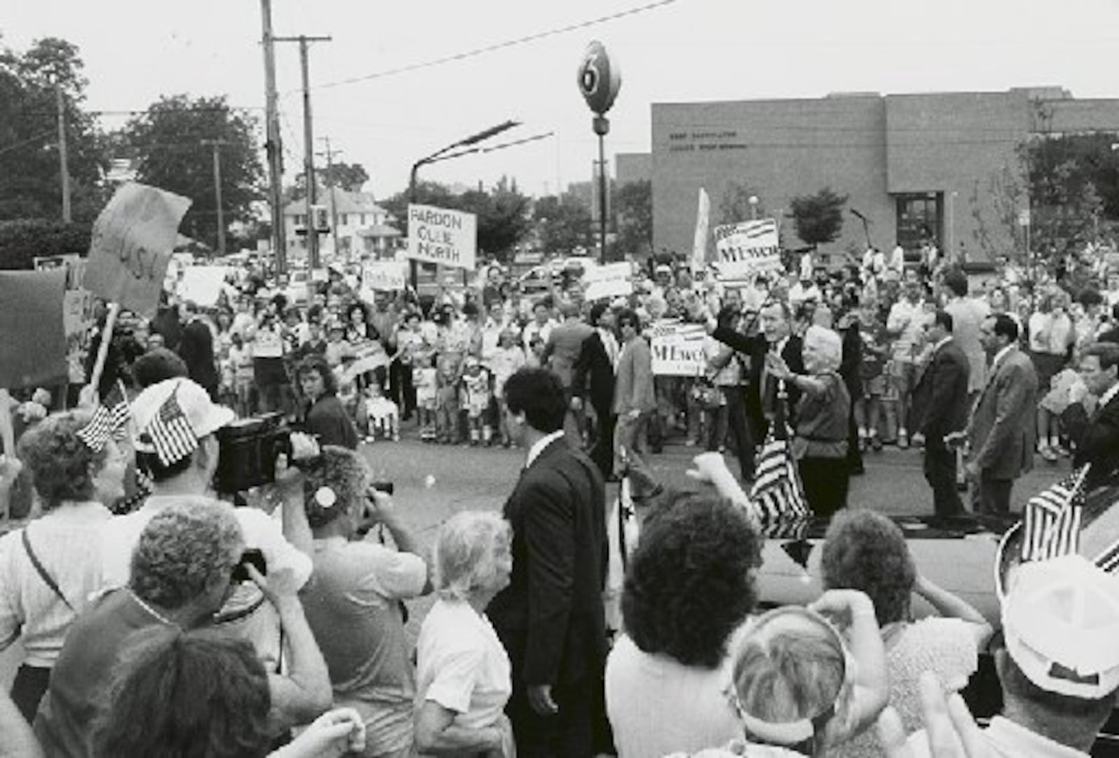 George and Barbara Bush wave at their supporters in West Carrollton in August 1988.