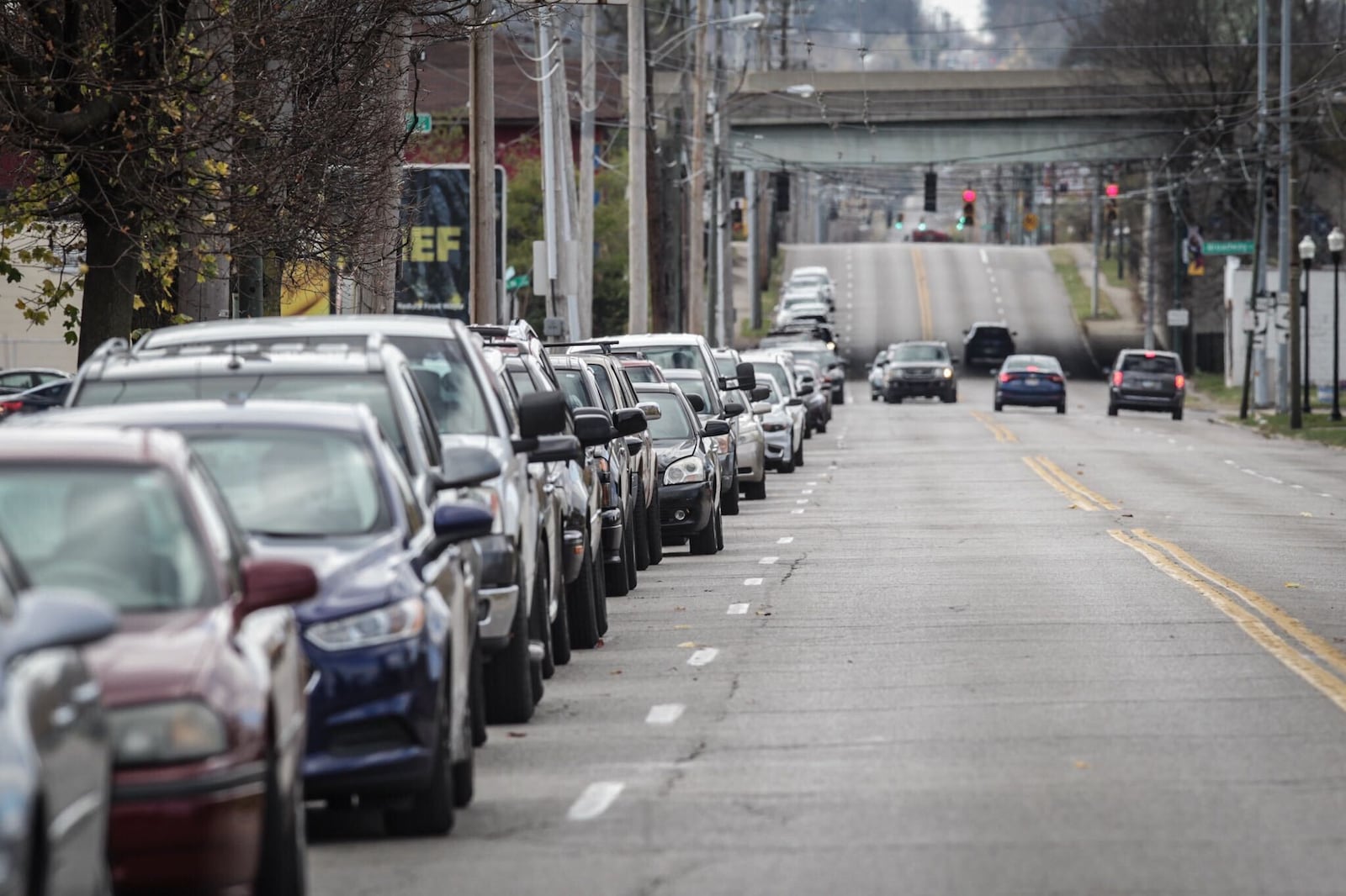 The Foodbank has a long line up Germantown St. in Dayton. JIM NOELKER/STAFF