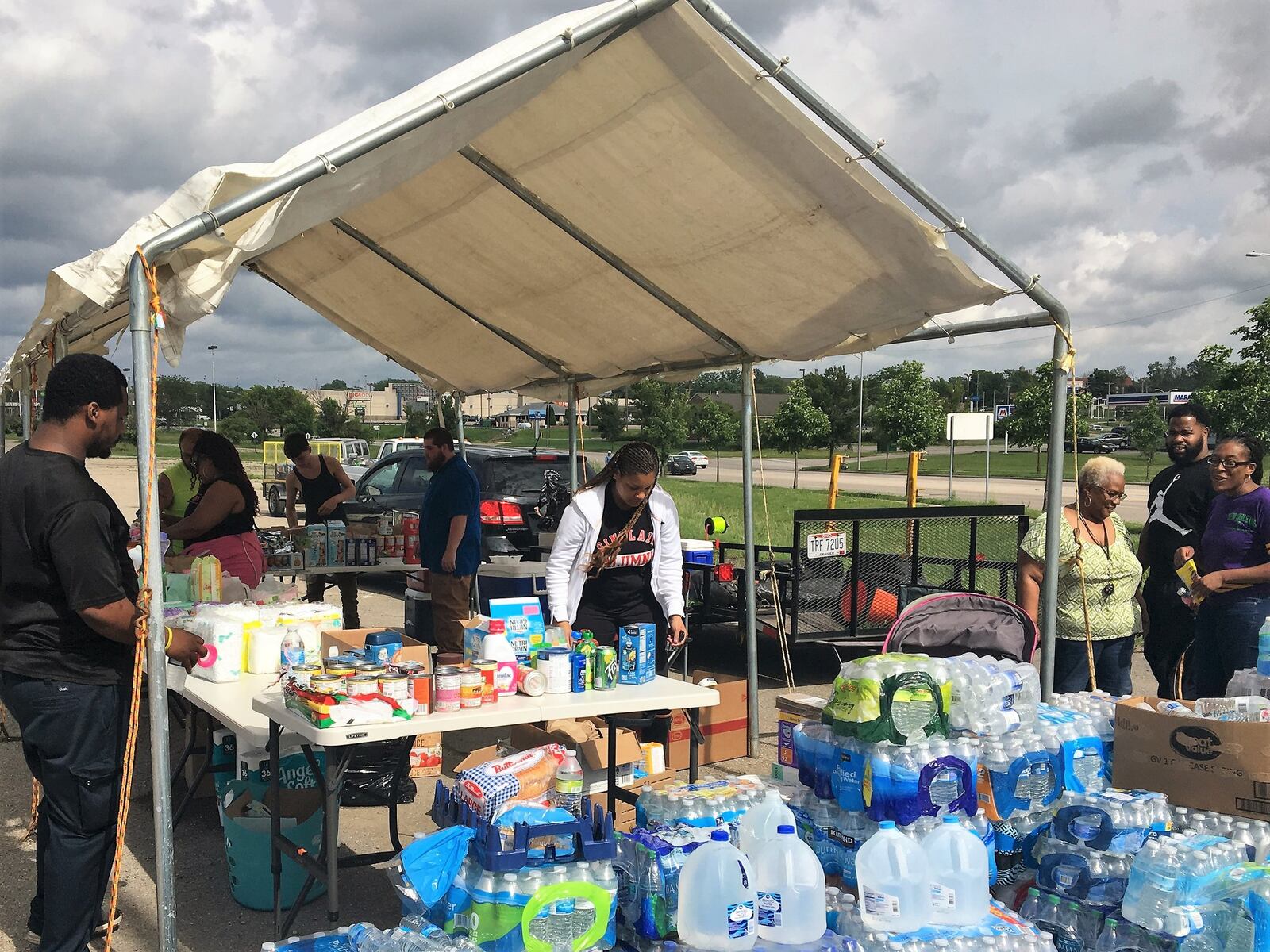 Volunteers collect and distribute supplies for tornado victims in the parking lot of the Home Depot in Trotwood on Thursday, May 30, 2019. KATIE WEDELL/STAFF