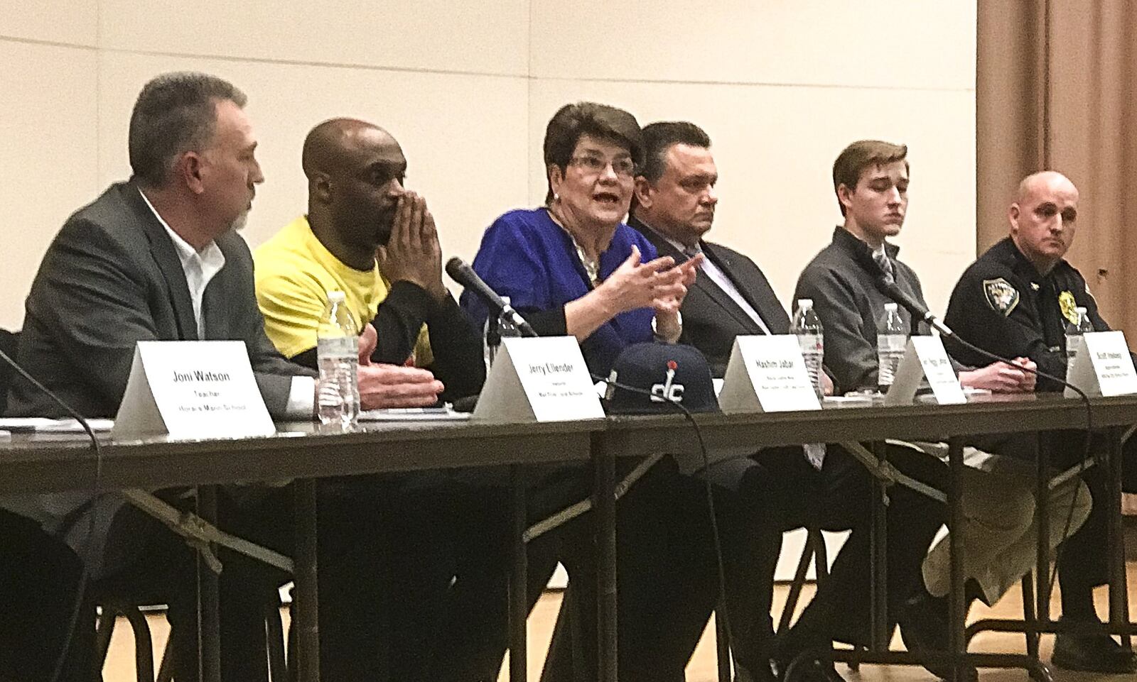 As a state Sen. Peggy Lehner, third from left, co-sponsored a bill requiring schools to notify parents within two hours if a child doesn’t show up for school. BEN McLAUGHLIN / STAFF