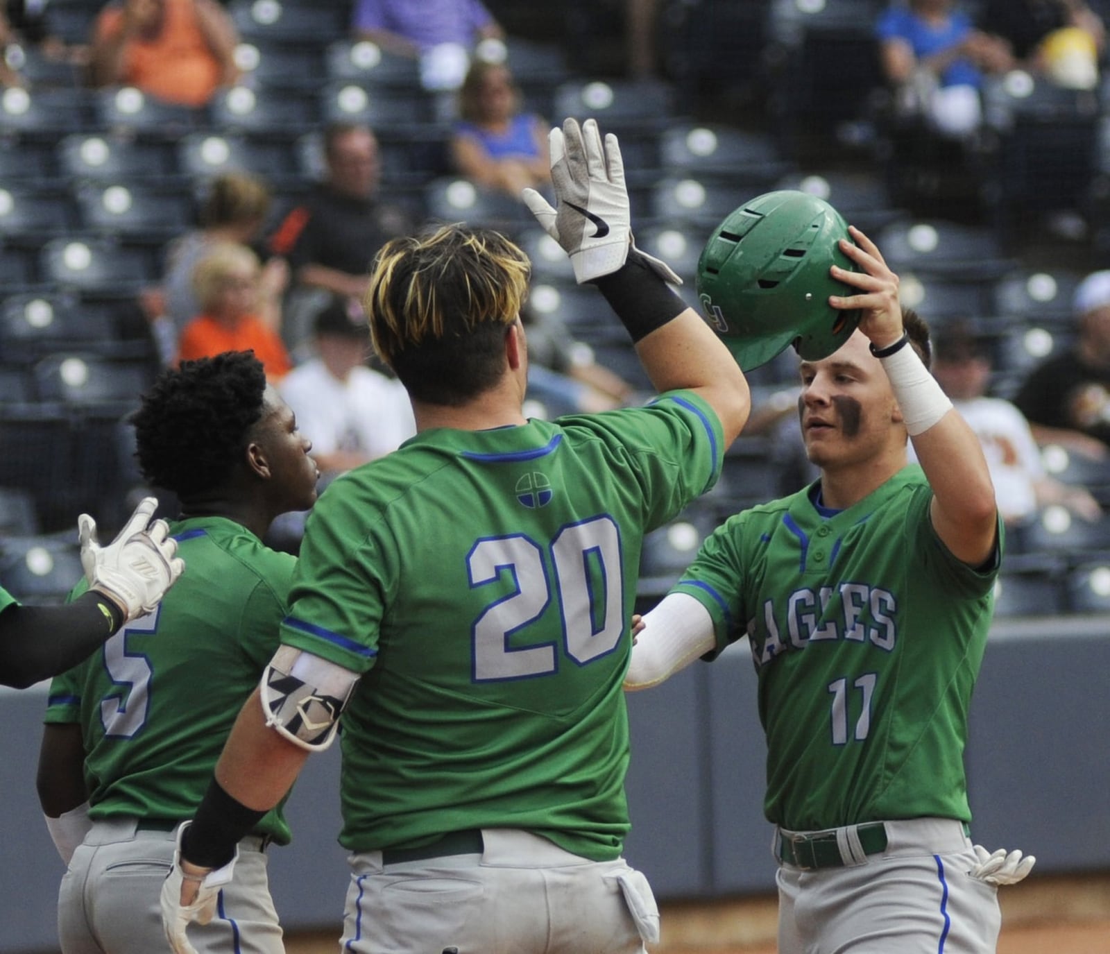 CJ’s A.J. Solomon (left) and Jacob Hieatt great Andrew Simones. Chaminade Julienne defeated Gates Mills Gilmour Academy 4-2 to defend its D-II high school baseball state championship at Canal Park in Akron on Sunday, June 9, 2019. MARC PENDLETON / STAFF