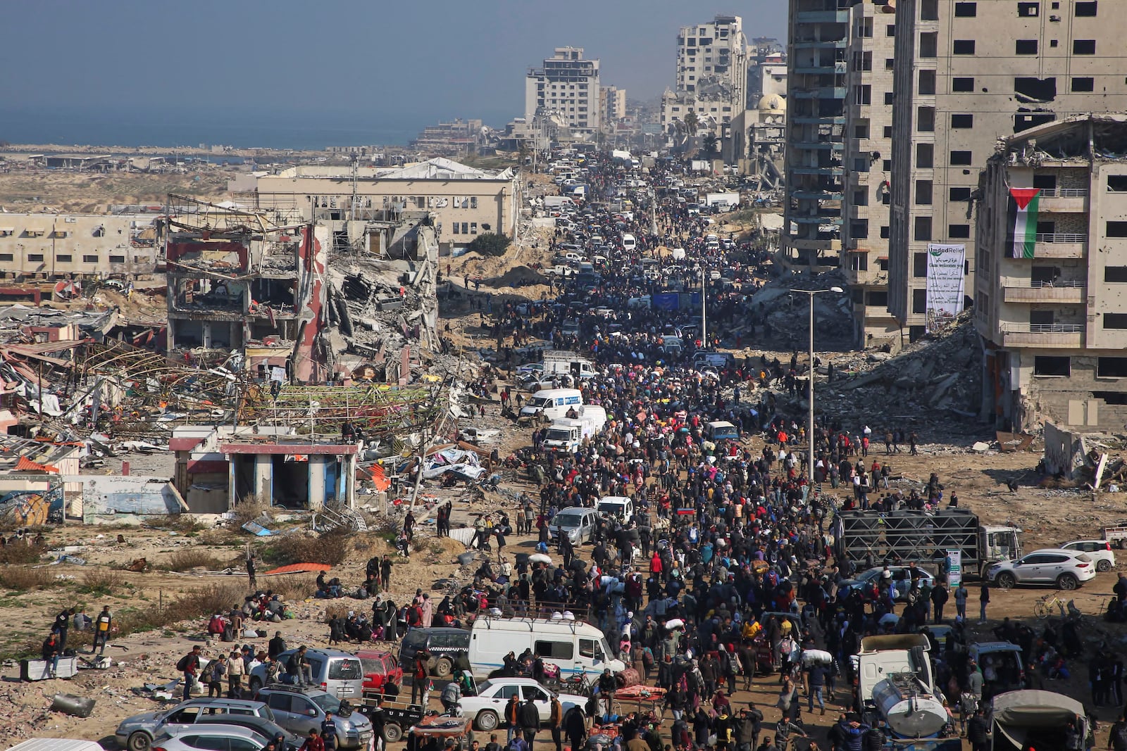 Displaced Palestinians return to their homes in the northern Gaza Strip, following Israel's decision to allow thousands of them to go back for the first time since the early weeks of the 15-month war with Hamas, Monday, Jan. 27, 2025. (AP Photo/Abed Hajjar)