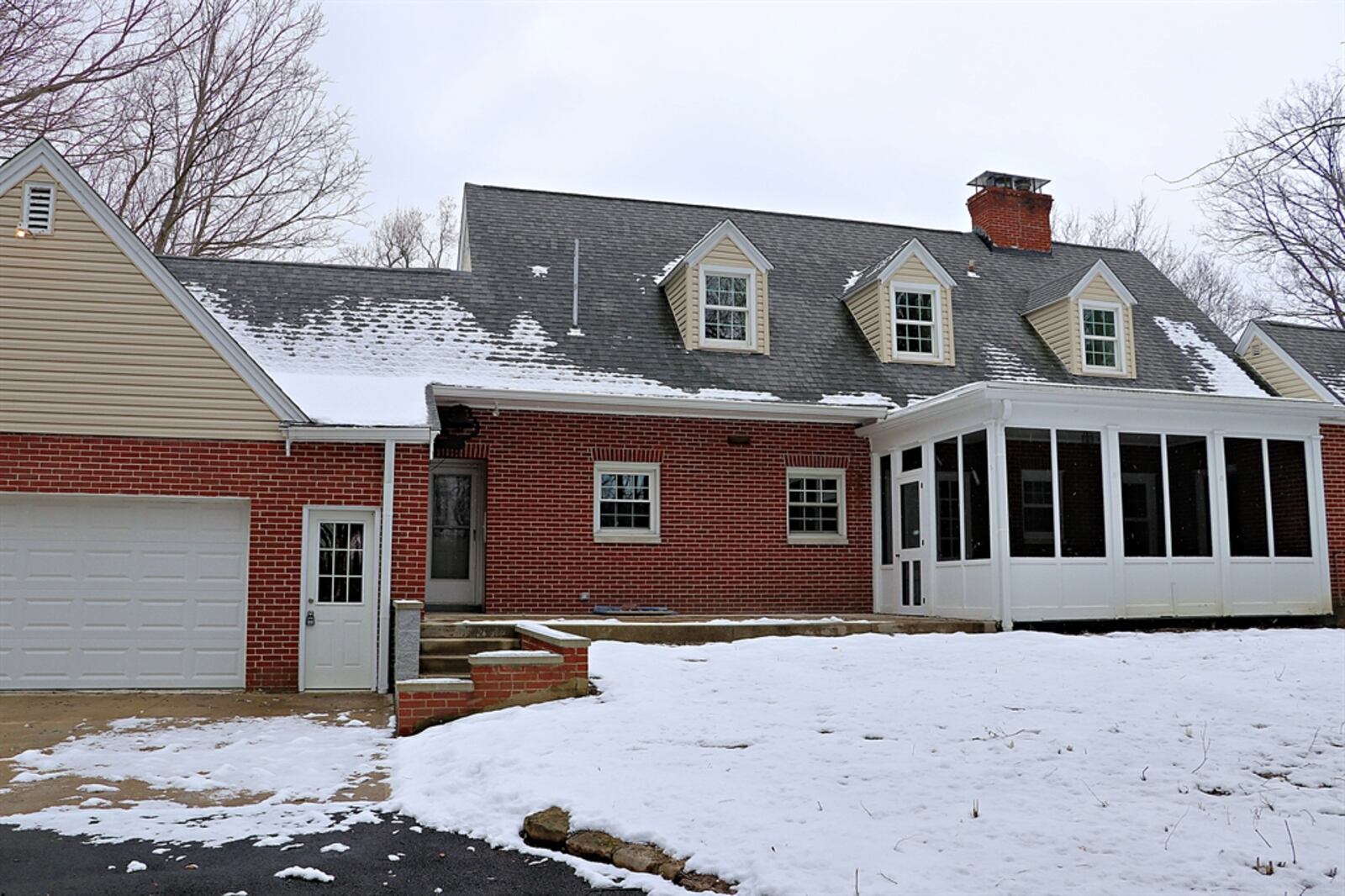 Little exterior maintenance is needed as the house has vinyl replacement windows throughout, a new roof and a renovated screen-enclosed porch.