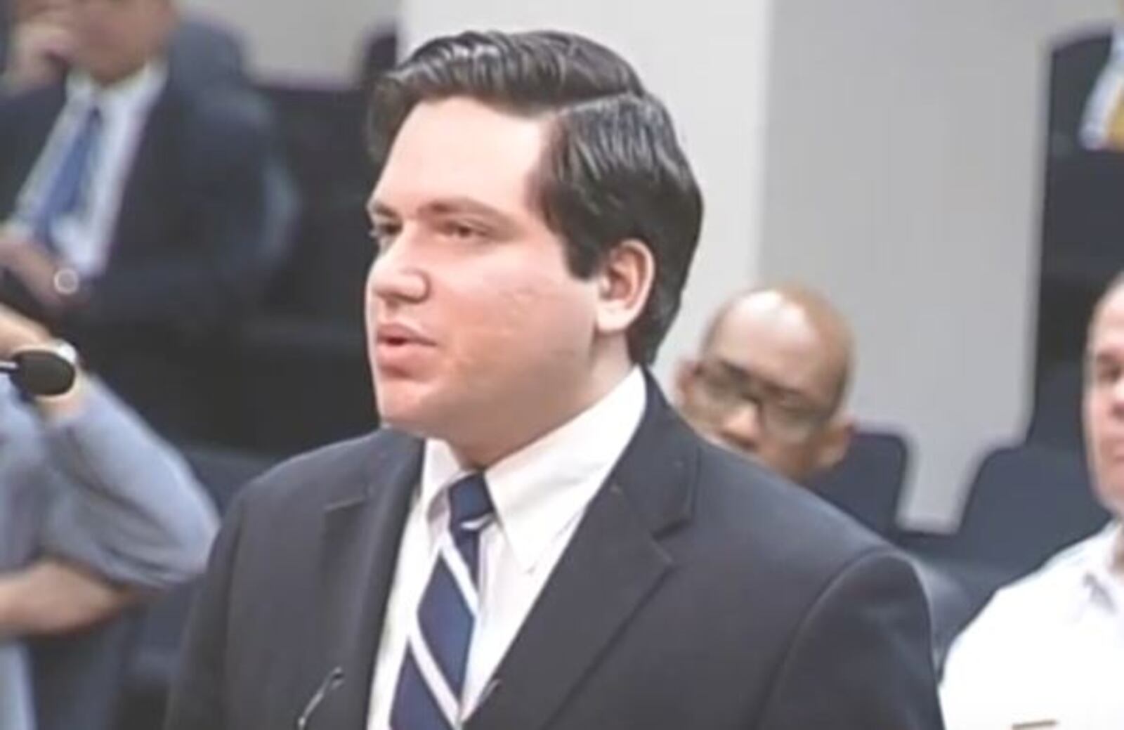 Nicholas Rossi, who also goes by the name Nicholas Alahverdian, speaks during the public comment portion of a Dayton City Commission meeting in late summer 2015. CONTRIBUTED