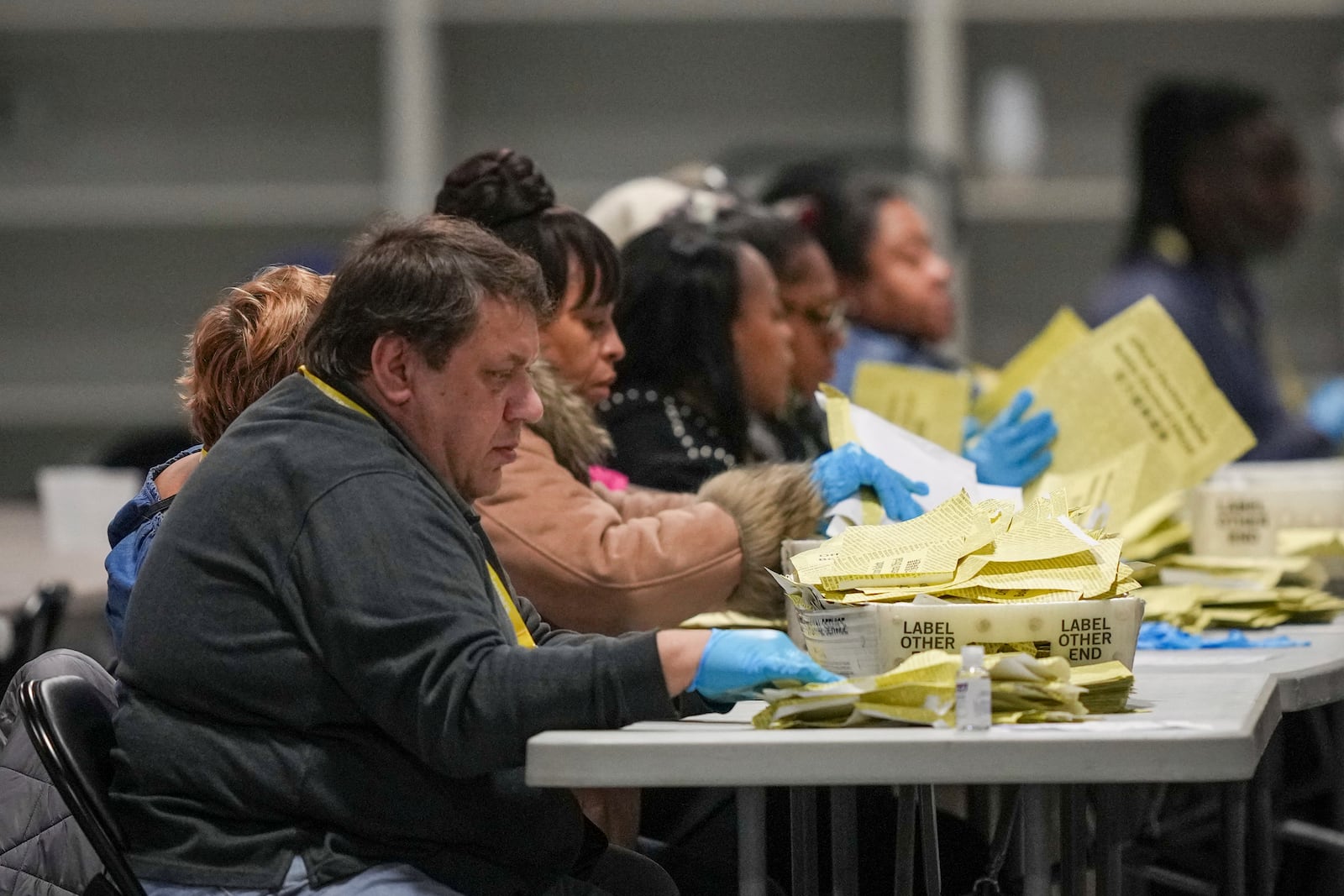 Election workers process mail-in ballots for the General Election at the Philadelphia Election Warehouse, Tuesday, Nov. 5, 2024, in Philadelphia. (AP Photo/Matt Rourke)