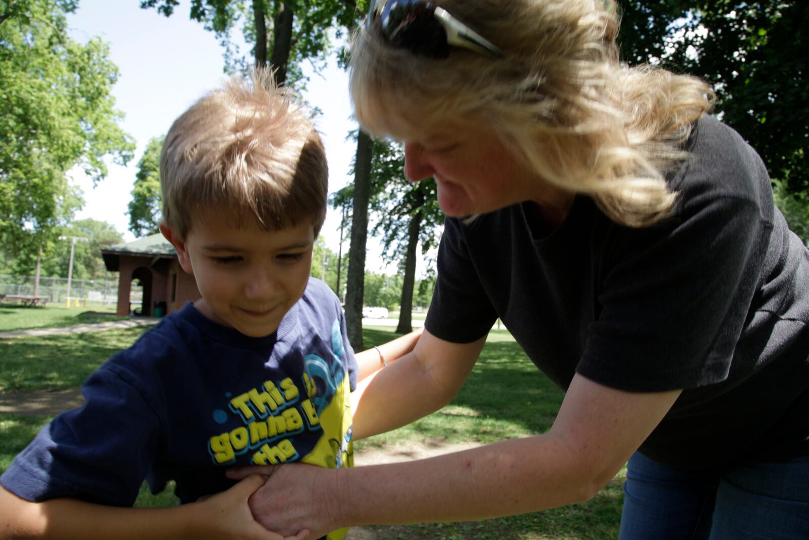 Karter plays with his grandmother Sandy Hinkle.