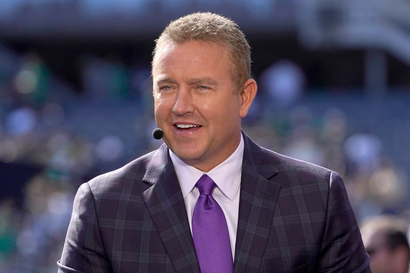 FILE - Kirk Herbstreit talks on the set of ESPN's College Game Day program at Soldier Field before an NCAA college football game between Wisconsin and Notre Dame Saturday, Sept. 25, 2021, in Chicago. Al Michaels and Kirk Herbstreit will be the announcer team when Prime Video takes over the “Thursday Night Football” package in September. The move was announced on Wednesday, ending weeks of speculation. (AP Photo/Charles Rex Arbogast, File)