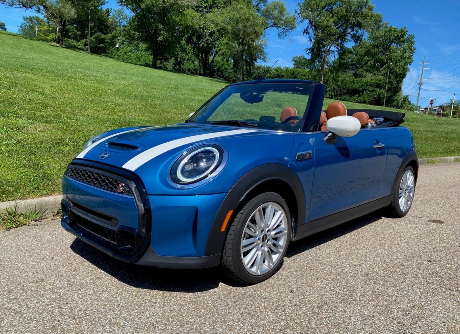 The Island Blue metallic exterior features white striping up the hood. The circular headlights are prototypical of a Mini Cooper. Contributed photo by Jimmy Dinsmore