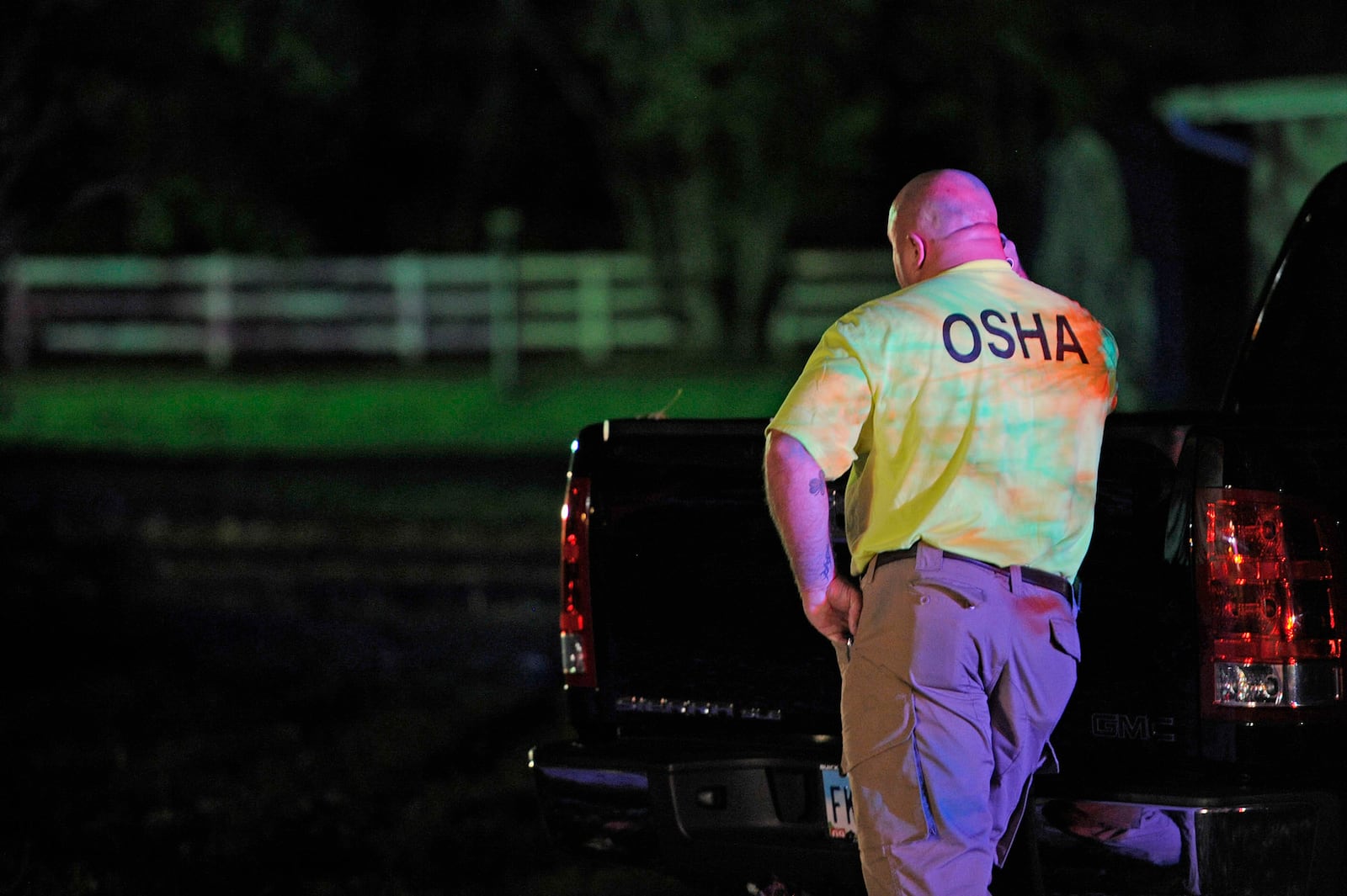 Two workers fell about 100 feet to their deaths Friday, Oct. 24, 2014, while painting a water tower along Oxford-Reily Road in Butler County. Detectives and investigators with the Occupational Safety and Health Administration were on the scene. Nick Graham/STAFF