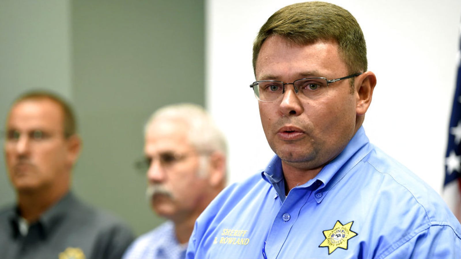 Maury County Sheriff Bucky Rowland speaks to the media Tuesday, Oct. 16, 2018, about an apparent murder-suicide that occurred the day before at a home in Columbia, Tennessee. Investigators say Cynthia Collier, 55, shot and killed her four adopted children, Kaileigh Lin, 17, Lia Lin, 15, and 14-year-olds Meigan Lin and Bo Li, before taking her own life. Rowland said Collier appeared to be a “very loving mother, with the exception of this one incident.” The motive for the homicides remains unknown.