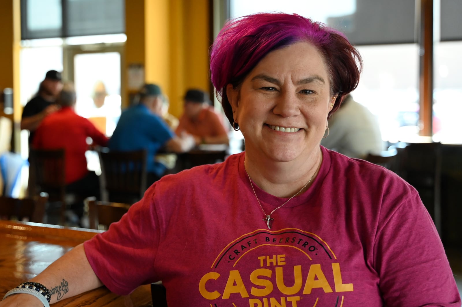 Ann Marie Cilley, owner of The Casual Pint of Hamilton, had many patrons and community members rally behind her when a flood happened in her Riverfront Plaza bar and restaurant, a couple of weeks before one of the biggest times of the year for her industry. Pictured is Cilley at The Casual Pint of Hamilton on Wednesday, March 12, 2025. MICHAEL D. PITMAN/STAFF