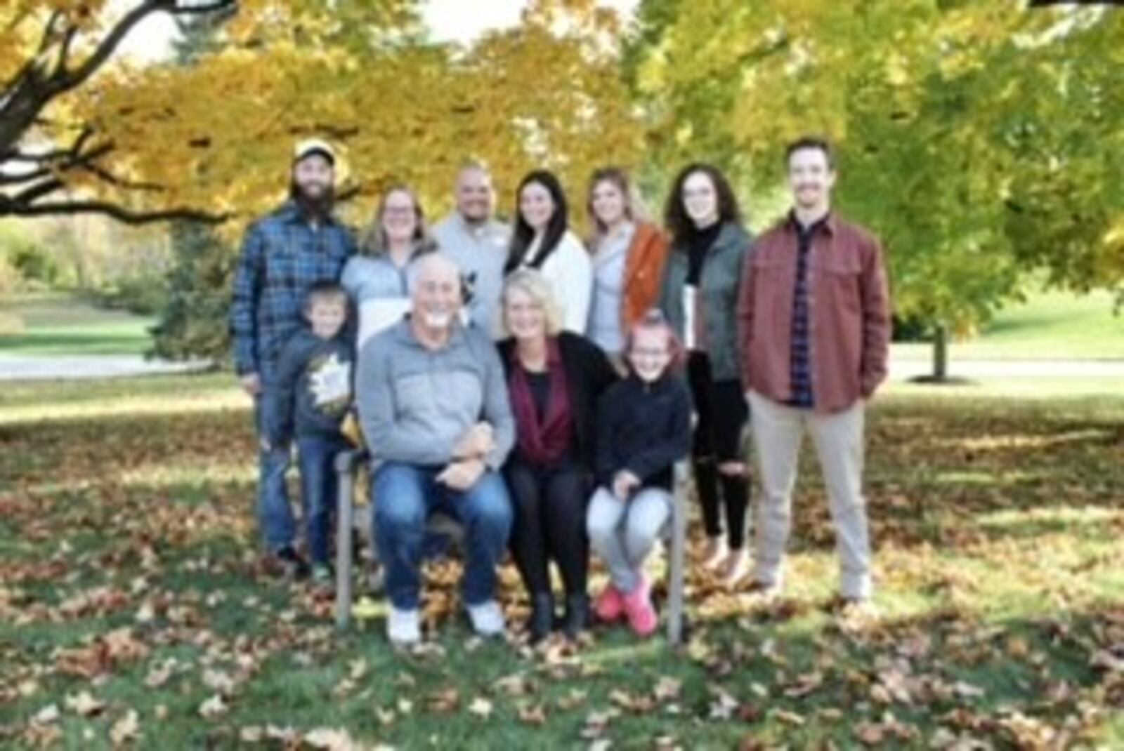 Donnie Deaton with his family a month after being diagnosed with Stage IV pancreatic cancer. (left to right in back) son Kevin & wife Jenny; daughter Laura (4th from left) and her husband Craig, Kaitlyn (Susan’s daughter); Emily (Susan daughter) and Ryan (Susan’s son); (In front, left to right) grandson Junior, Donnie, Susan and granddaughter Isabella. CONTRIBUTED