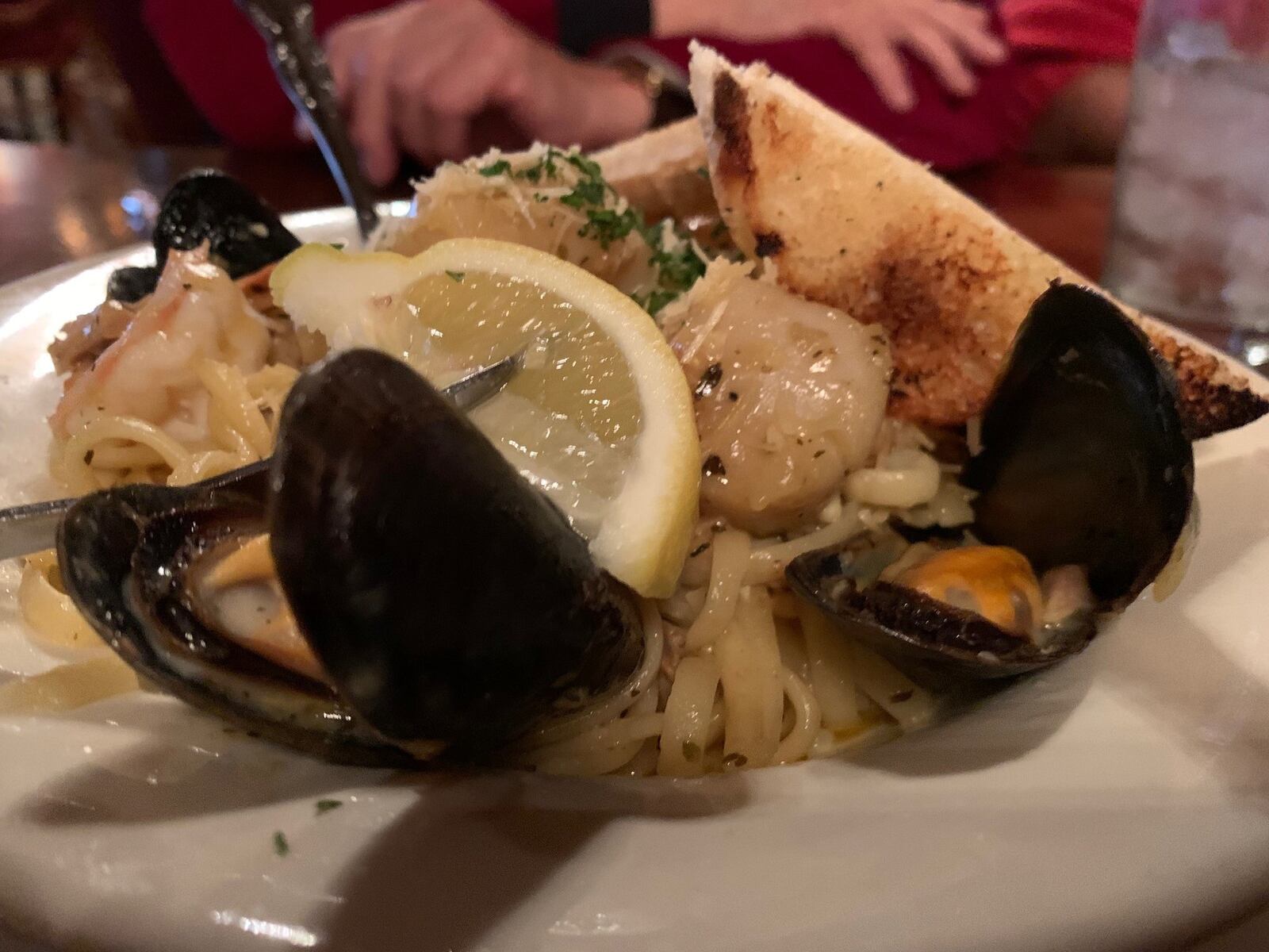 Jay’s Linguine al Frutti di Mal is tossed with shrimp, scallops, mussels and chopped clams in a white wine garlic butter sauce topped with Parmesan cheese. Pictured is the lunch portion. CONTRIBUTED/ALEXIS LARSEN