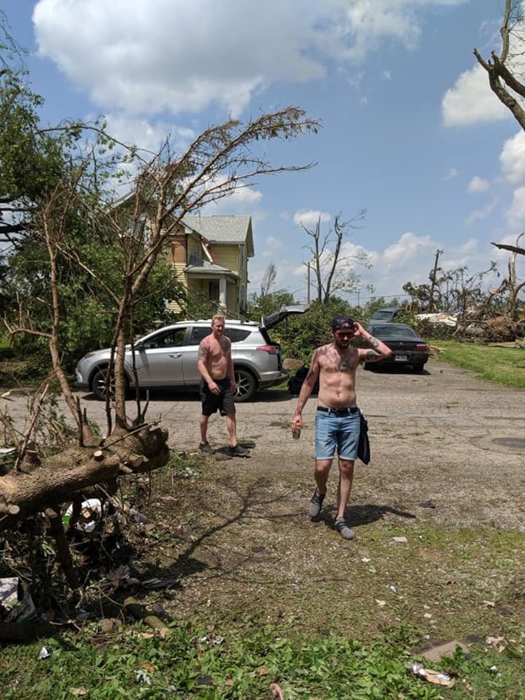 Photos: Community rallies around Dayton restaurant owner after son’s death, tornado