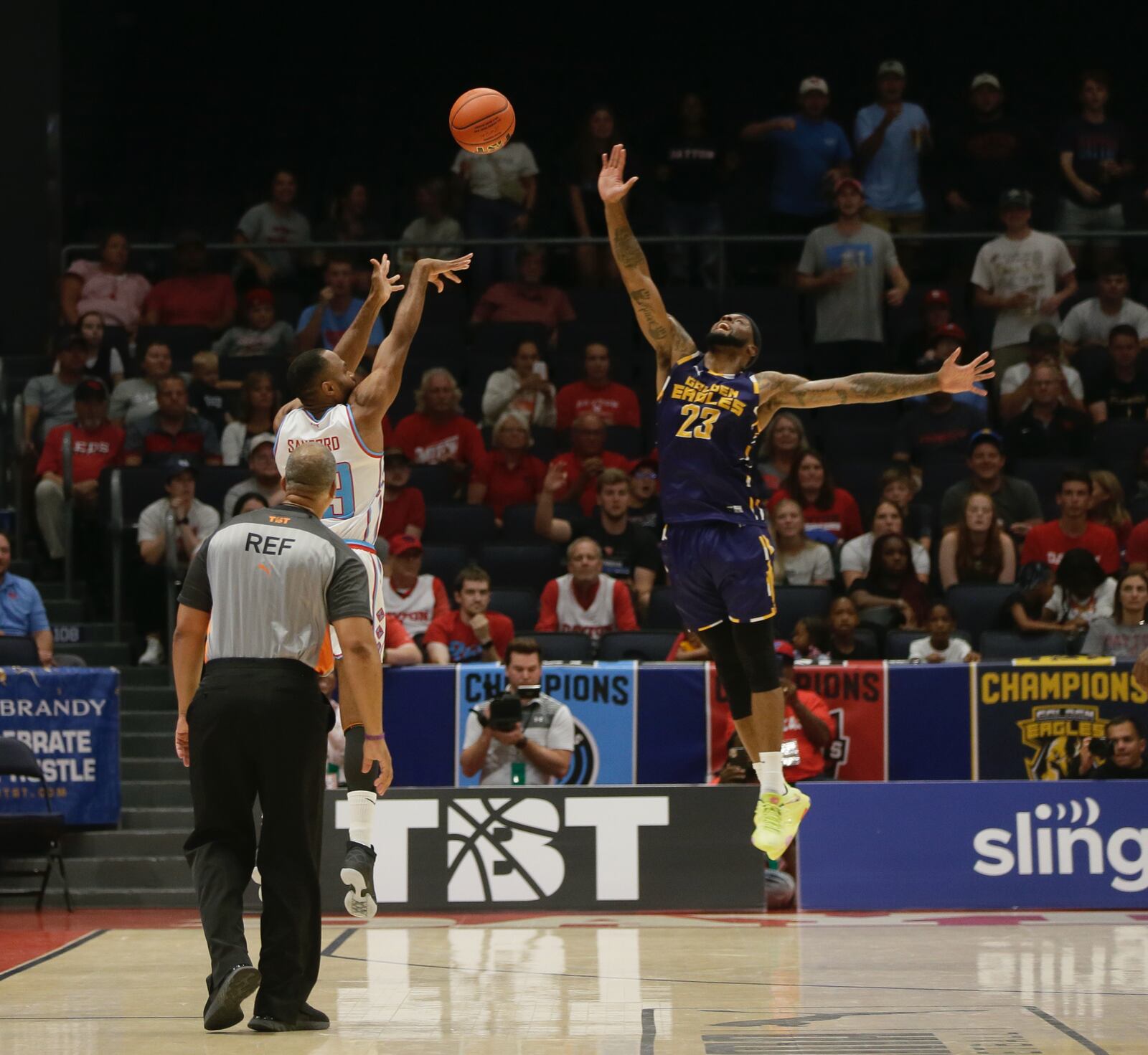 The Red Scare's Vee Sanford makes a 3-pointer to end the first half against the Golden Eagles in The Basketball Tournament on Wednesday, July 27, 2022, at UD Arena. David Jablonski/Staff