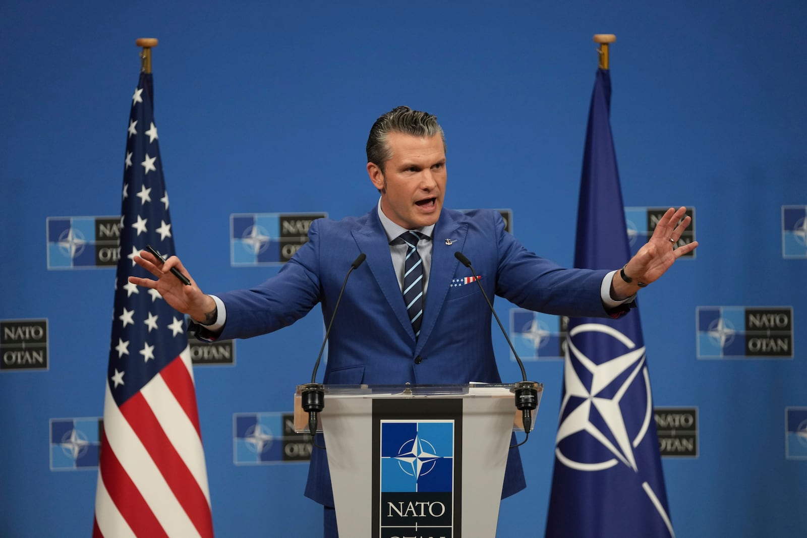 U.S. Secretary of Defense Pete Hegseth speaks after a meeting of NATO defense ministers at NATO headquarters in Brussels, Thursday, Feb. 13, 2025. (AP Photo/Virginia Mayo)