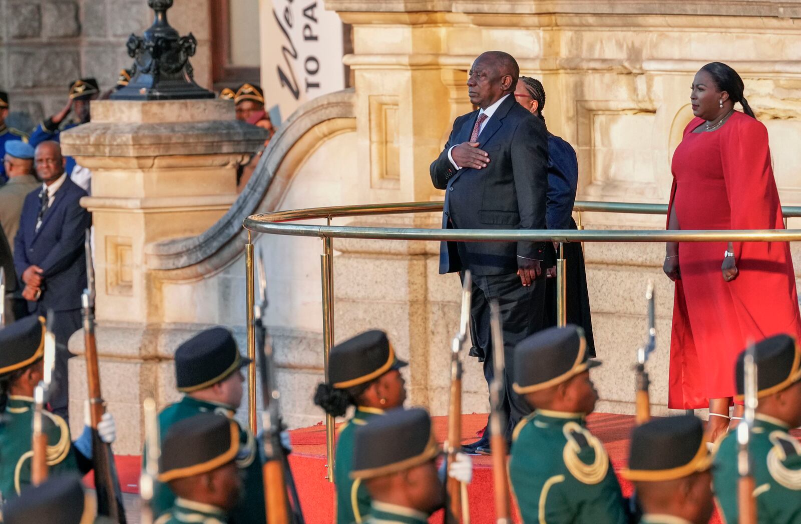 South African President Cyril Ramaphosa gestures for the national anthem from the steps of Cape Town's city hall before delivering his annual state of the union address, Thursday, Feb. 6, 2025. (AP Photo/Nardus Engelbrecht)