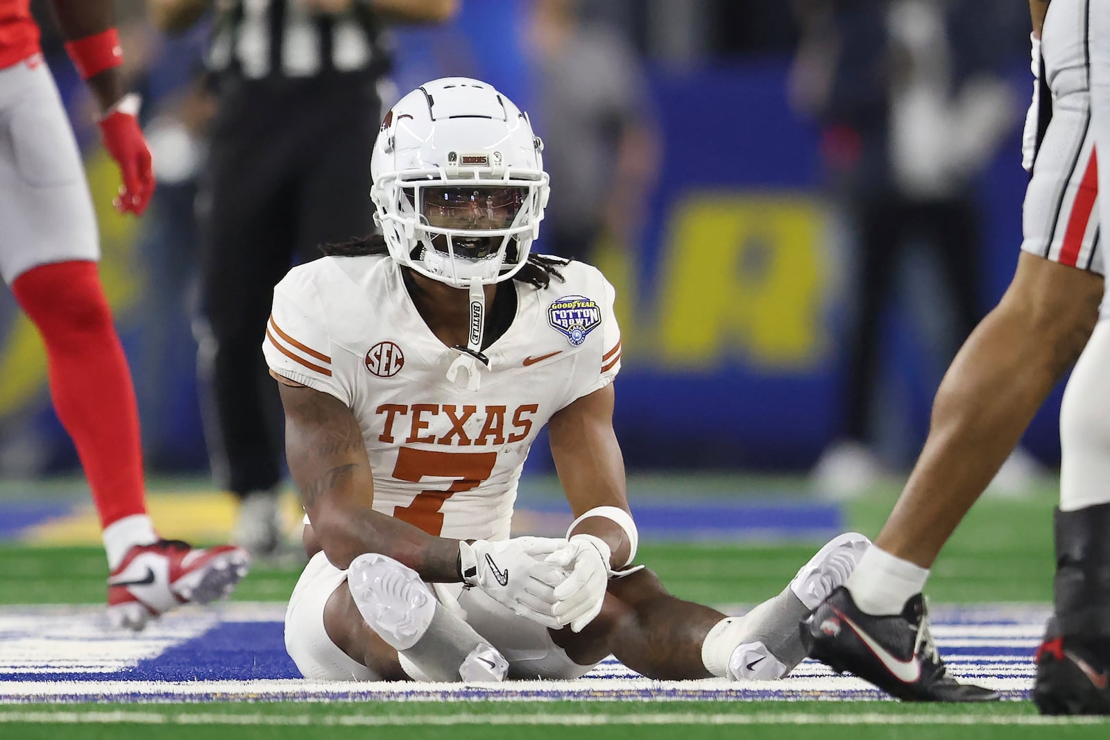 Texas wide receiver Isaiah Bond (7) reacts after an incomplete pass during the first half of the Cotton Bowl College Football Playoff semifinal game against Ohio State, Friday, Jan. 10, 2025, in Arlington, Texas. (AP Photo/Gareth Patterson)