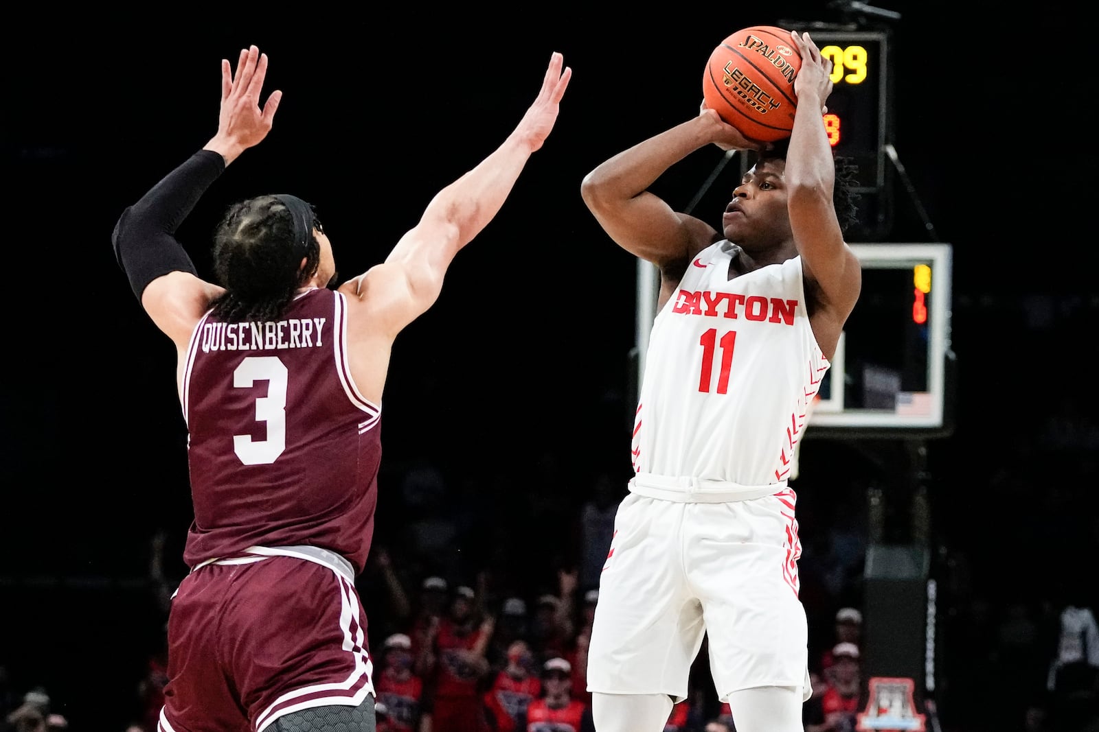 Dayton's Malachi Smith (11) shoots over Fordham's Darius Quisenberry (3) during the first half of an NCAA college basketball game in the semifinals of the Atlantic 10 Conference Tournament, Saturday, March 11, 2023, in New York. (AP Photo/Frank Franklin II)