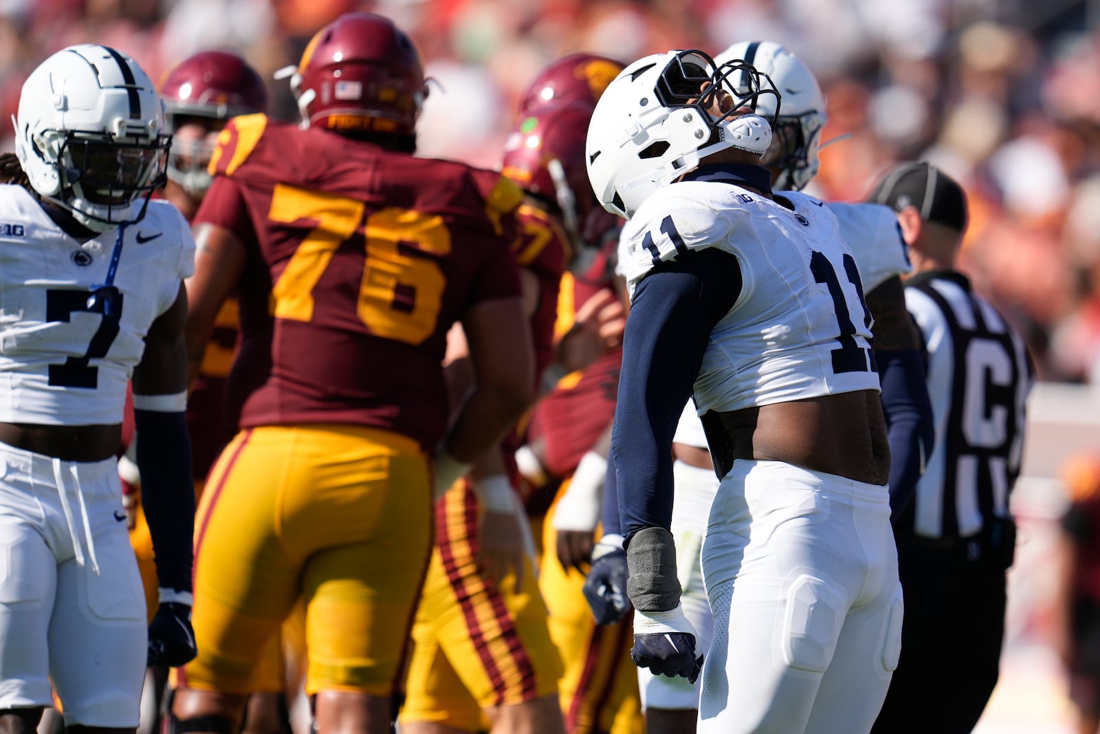 Penn State defensive end Abdul Carter (11) reacts after sacking Southern California quarterback Miller Moss during the second half of an NCAA college football game Saturday, Oct. 12, 2024, in Los Angeles. (AP Photo/Marcio Jose Sanchez)