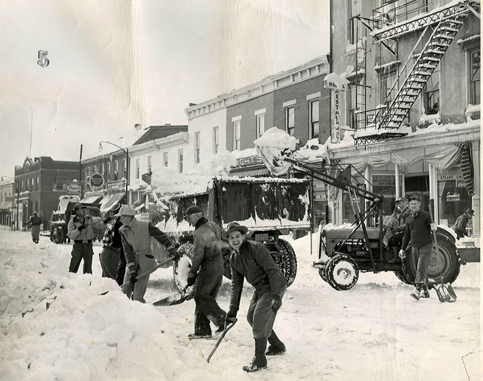 Crews start digging out from the blizzard of1950 in New Carlisle. DAYTON DAILY NEWS FILE PHOTO