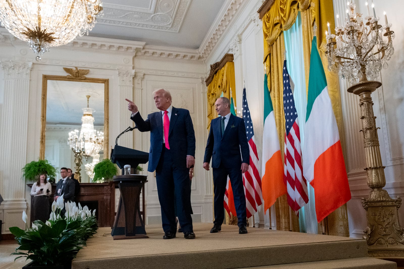 President Donald Trump departs with Ireland's Prime Minister Micheál Martin after an event in the East Room of the White House in Washington, Wednesday, March 12, 2025. (AP Photo/Alex Brandon)