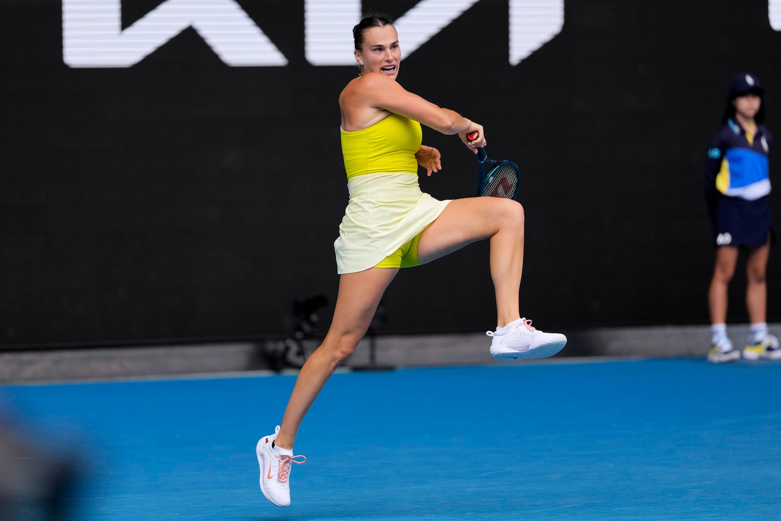 Aryna Sabalenka of Belarus plays a forehand return to Jessica Bouzas Maneiro of Spain during their second round match at the Australian Open tennis championship in Melbourne, Australia, Wednesday, Jan. 15, 2025. (AP Photo/Vincent Thian)